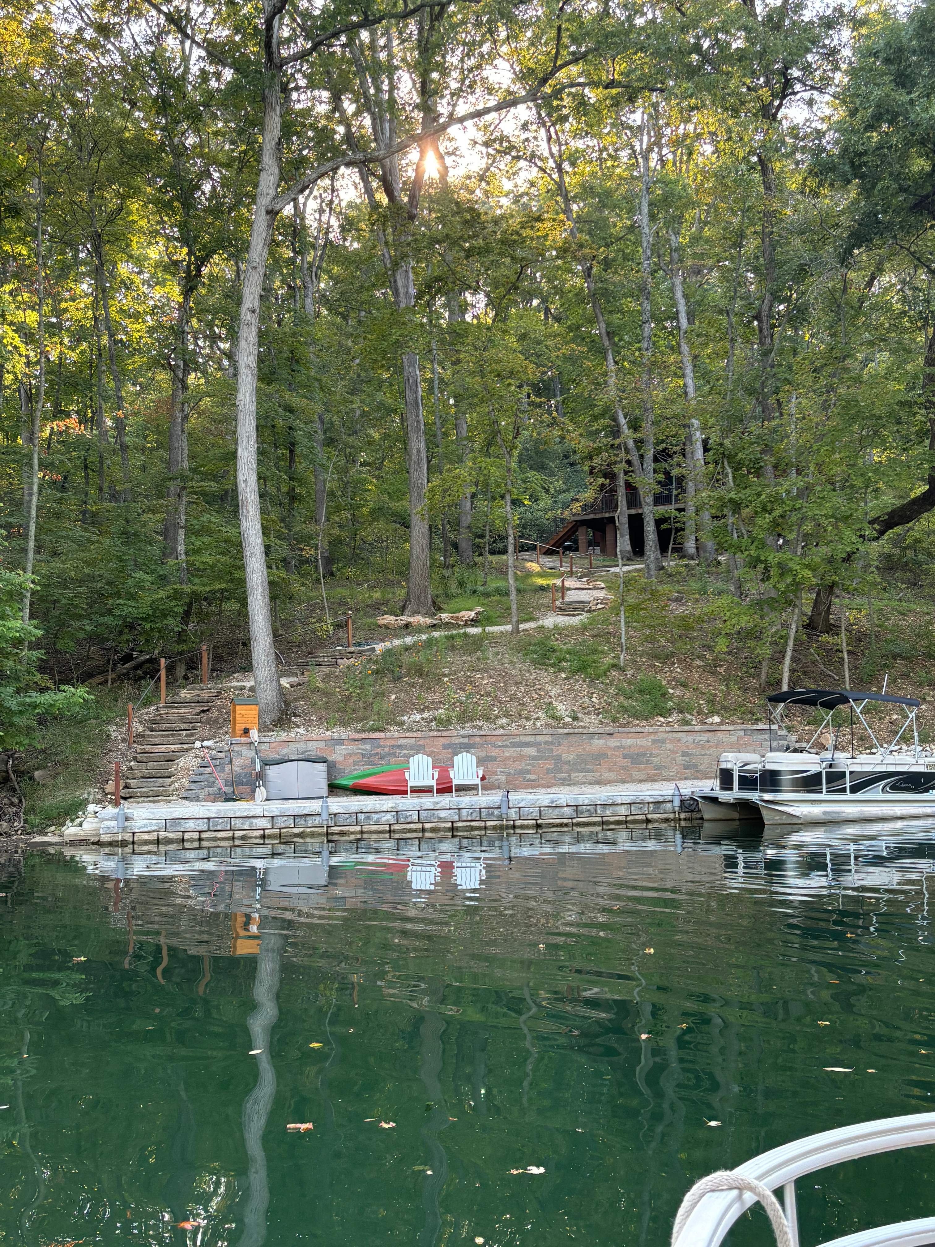 Backyard Lakeside Transformation by Loch Ness Landscaping, LLC