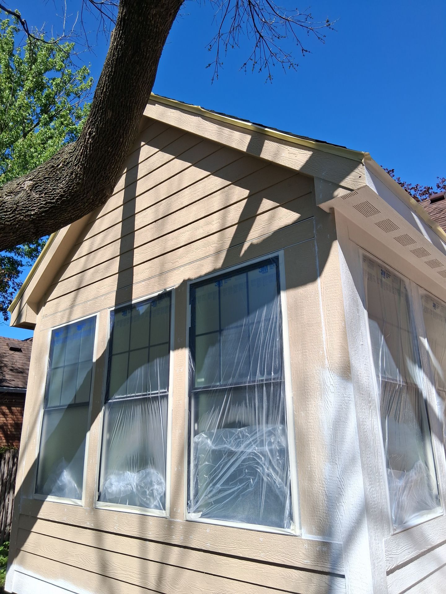 New 4 season room interior & exterior painting by Midwest Paint LLC