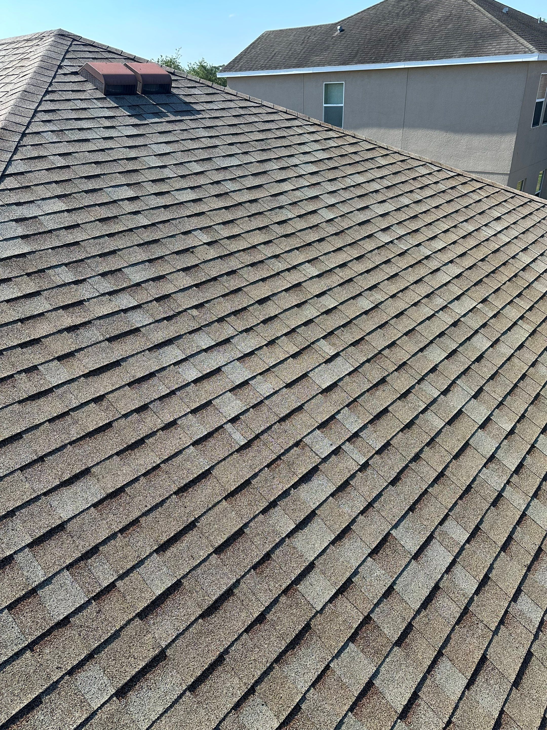 Asphalt Shingle Roof Soft Wash Cleaning & Concrete Pressure Washing in CopperStone Community, Parrish, FL by Sunshine AquaWash