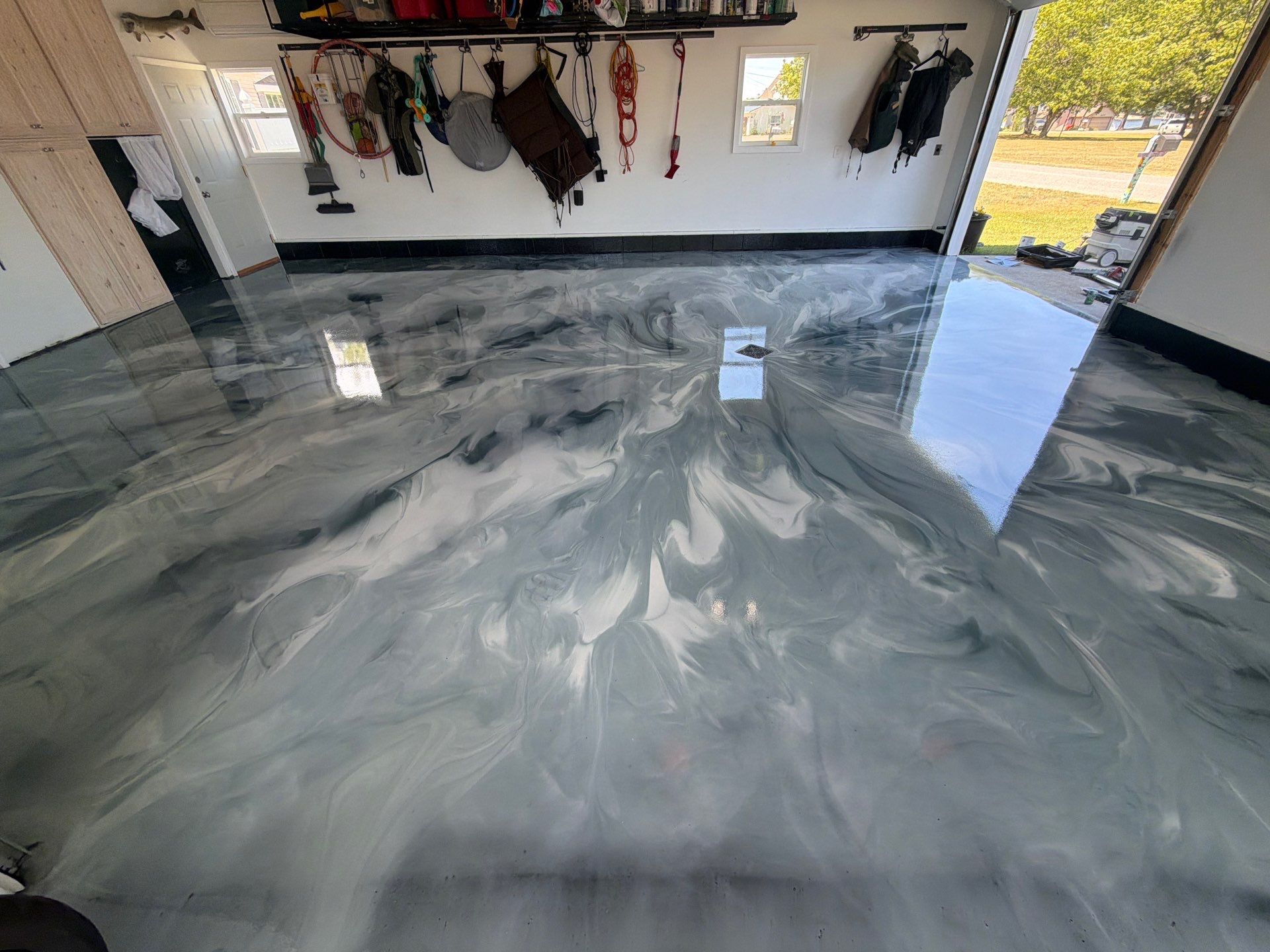 Custom Metallic Epoxy Floor and Polished Countertop Installation in Mears by Gordon Painting