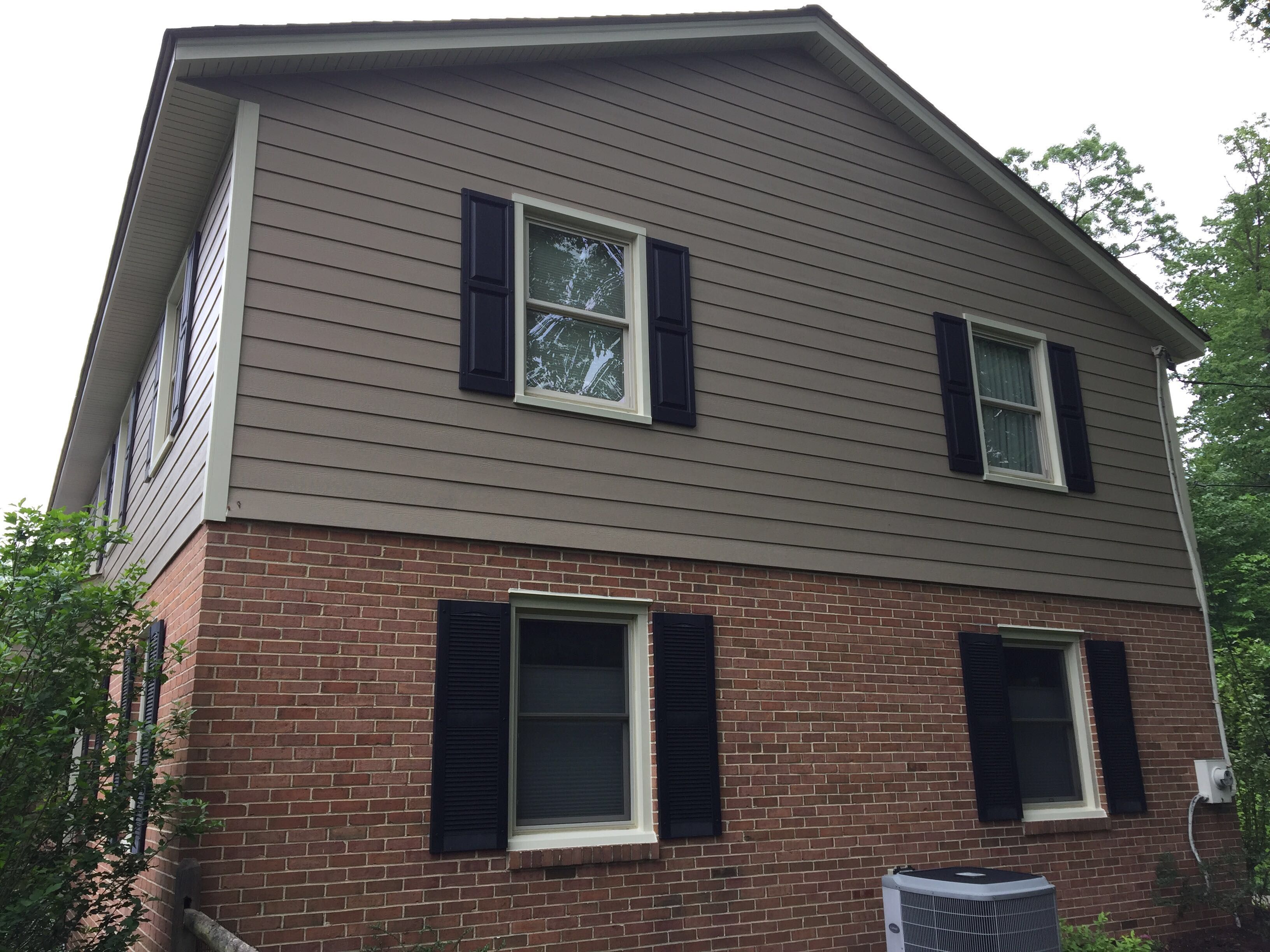 Siding and Roof Replacement by American Home Contractors