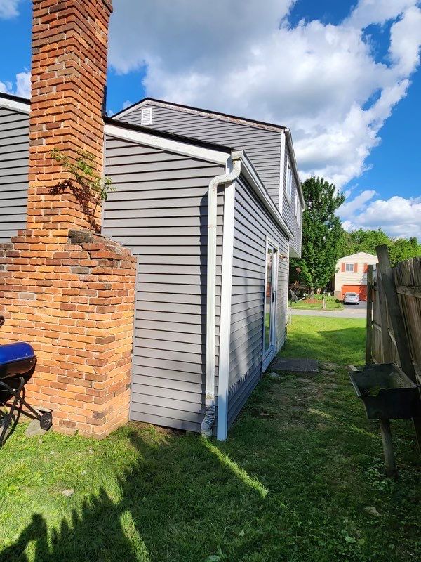 Siding Installation using Exterior Portfolio Vinyl Siding by SOS Home Ohio 