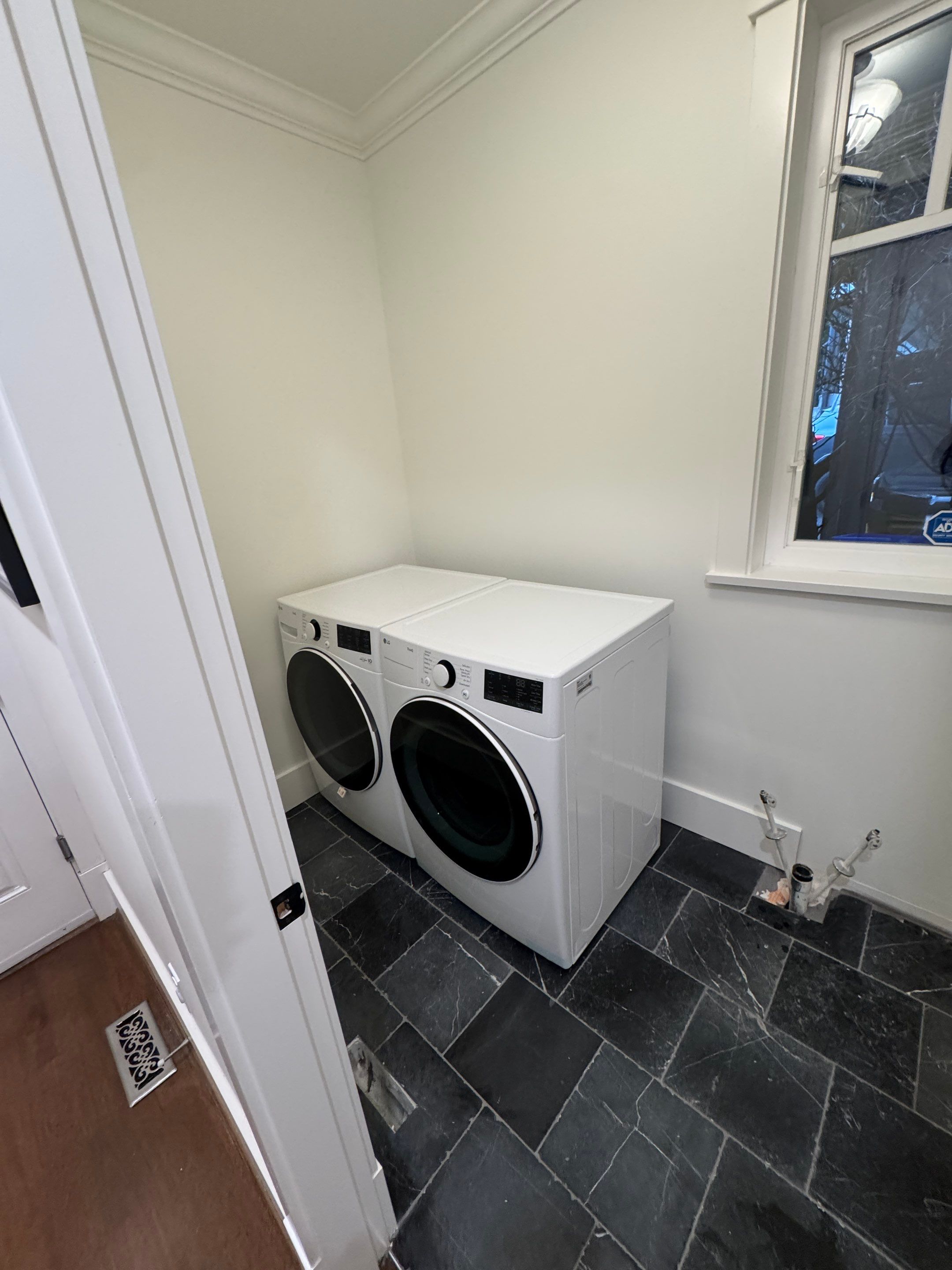 High-End Laundry Room Renovation and Restoration in Vancouver by YVR Construction Group