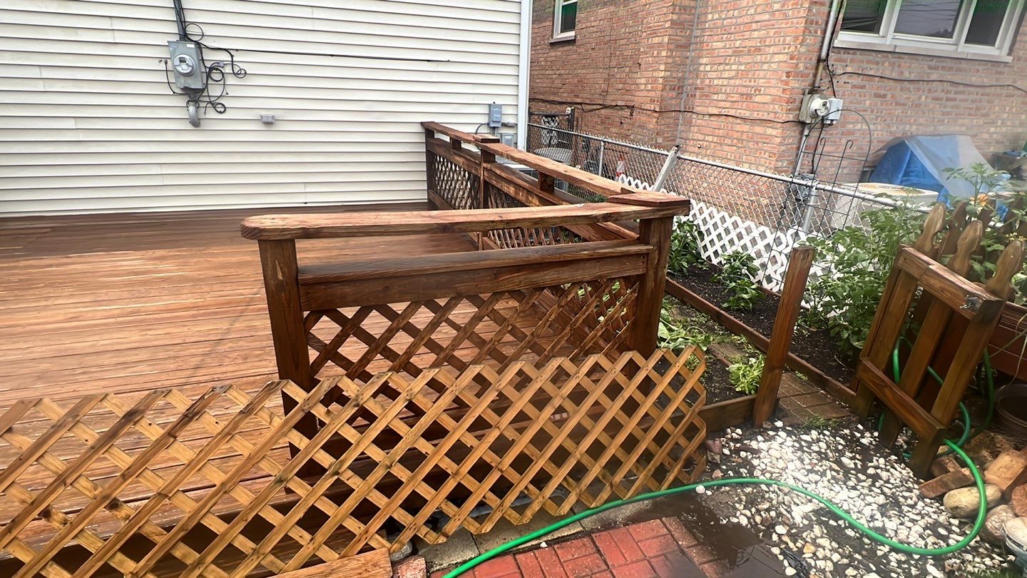 Wood cleaning and staining using Armstrong cloark oil stain by Northern Power Washing LLC.