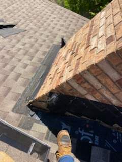 Cricket and Flashing Repair  by Rhino Roofing and General Contracting, LLC
