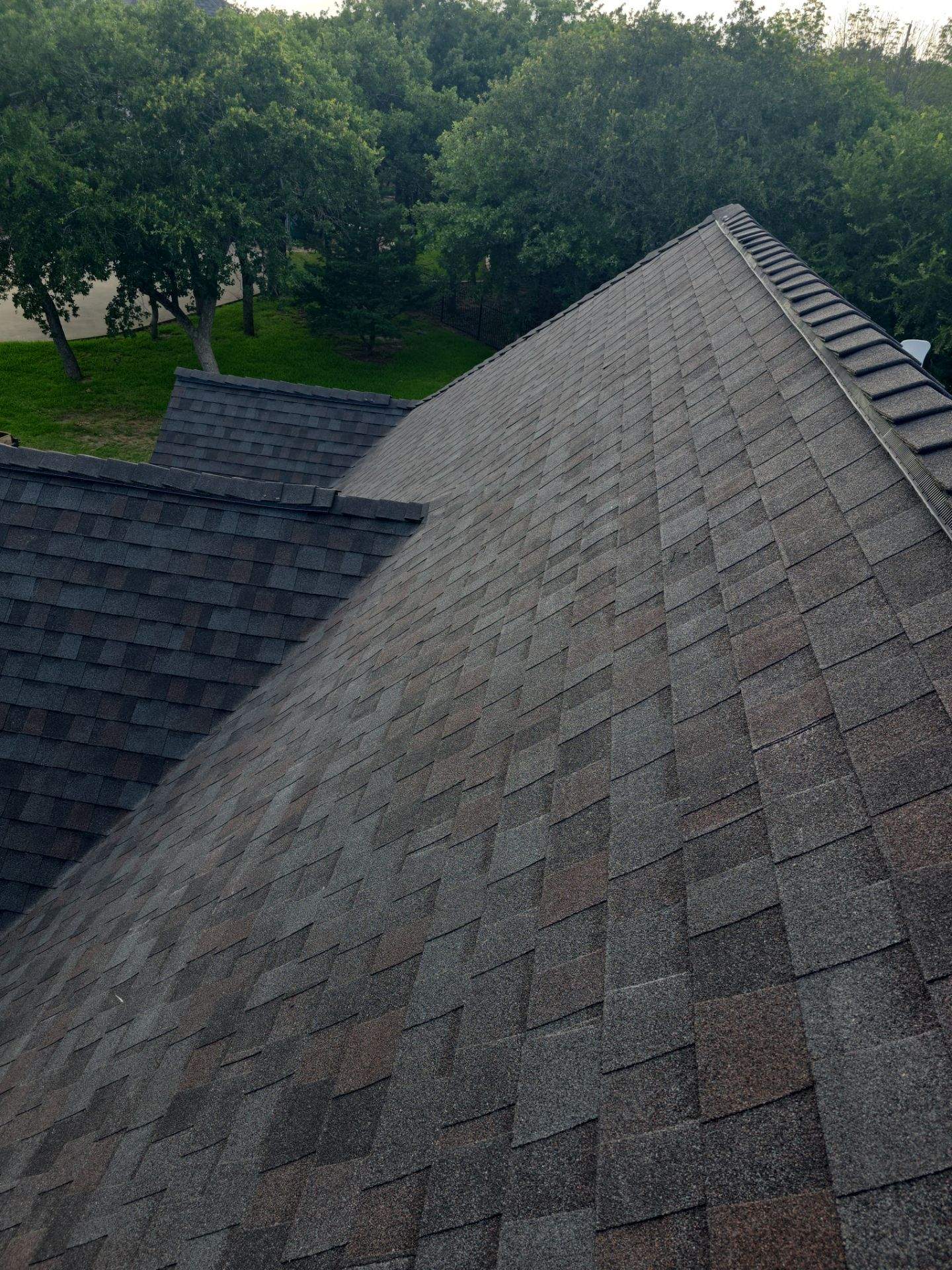Residential Roof Replacement Using Tamko Titan Shingles in Runaway Bay by Armor Roofing | Exteriors