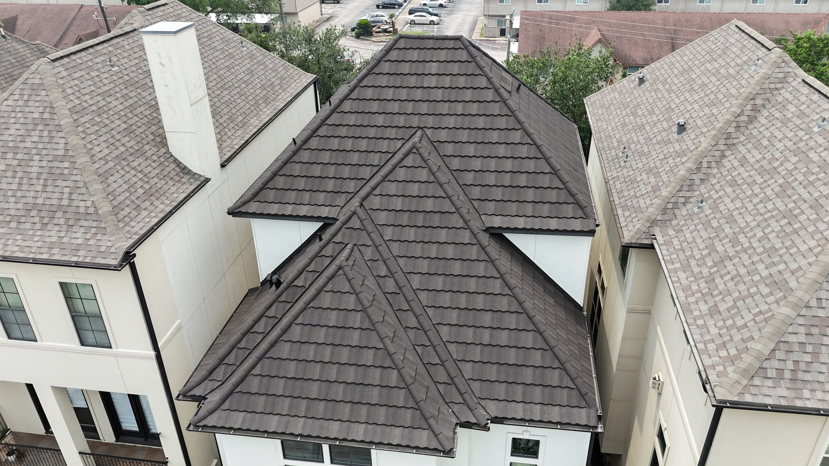 Stunning transformation from Shingles to DECRA Tile by Core Four Roofing
