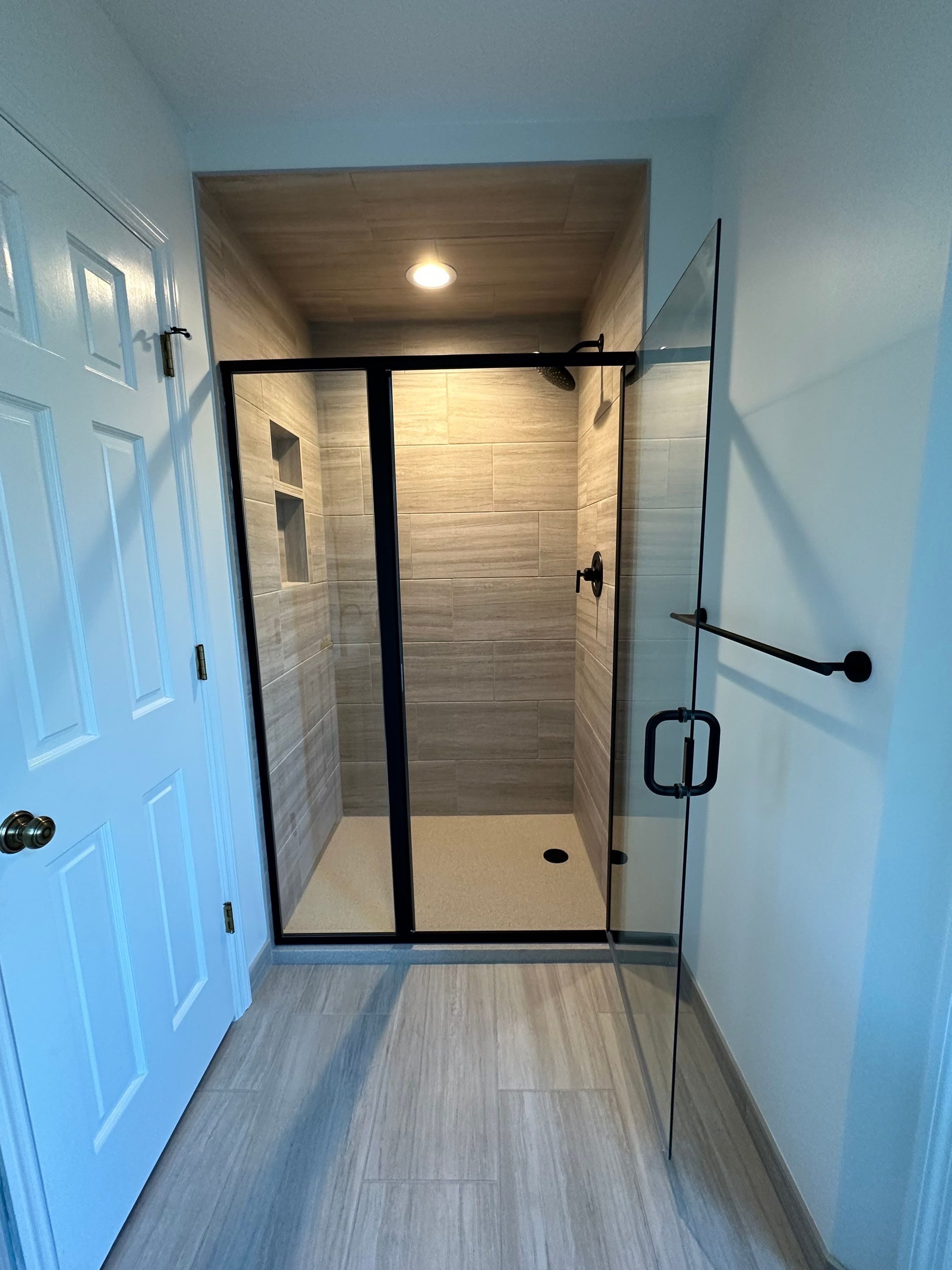 West Omaha Spa-Style Primary Bath Refresh by Bennett Design + Build