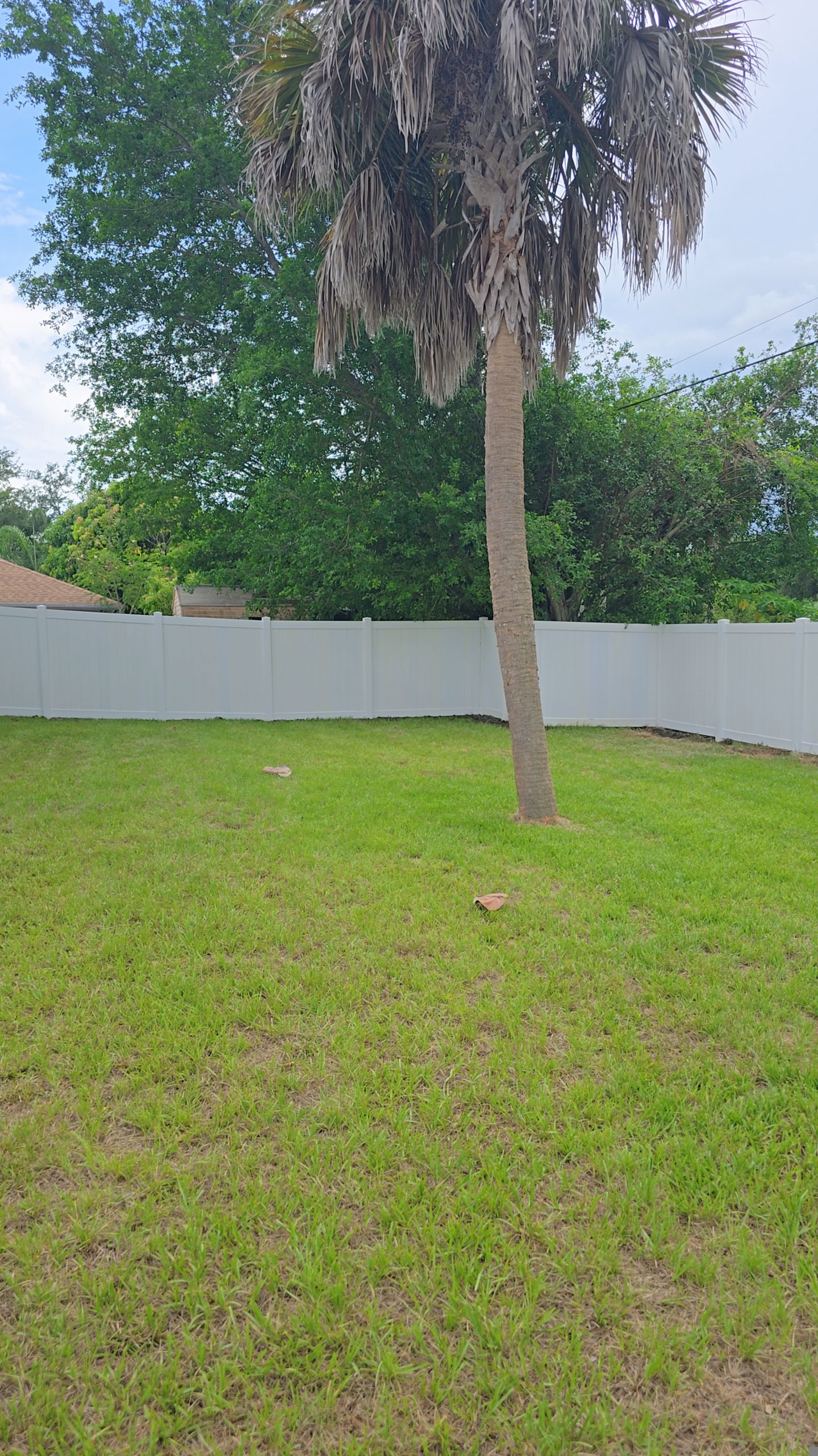 White Vinyl Privacy Fence Installation and Gate Repair in Port Charlotte by True Fence LLC