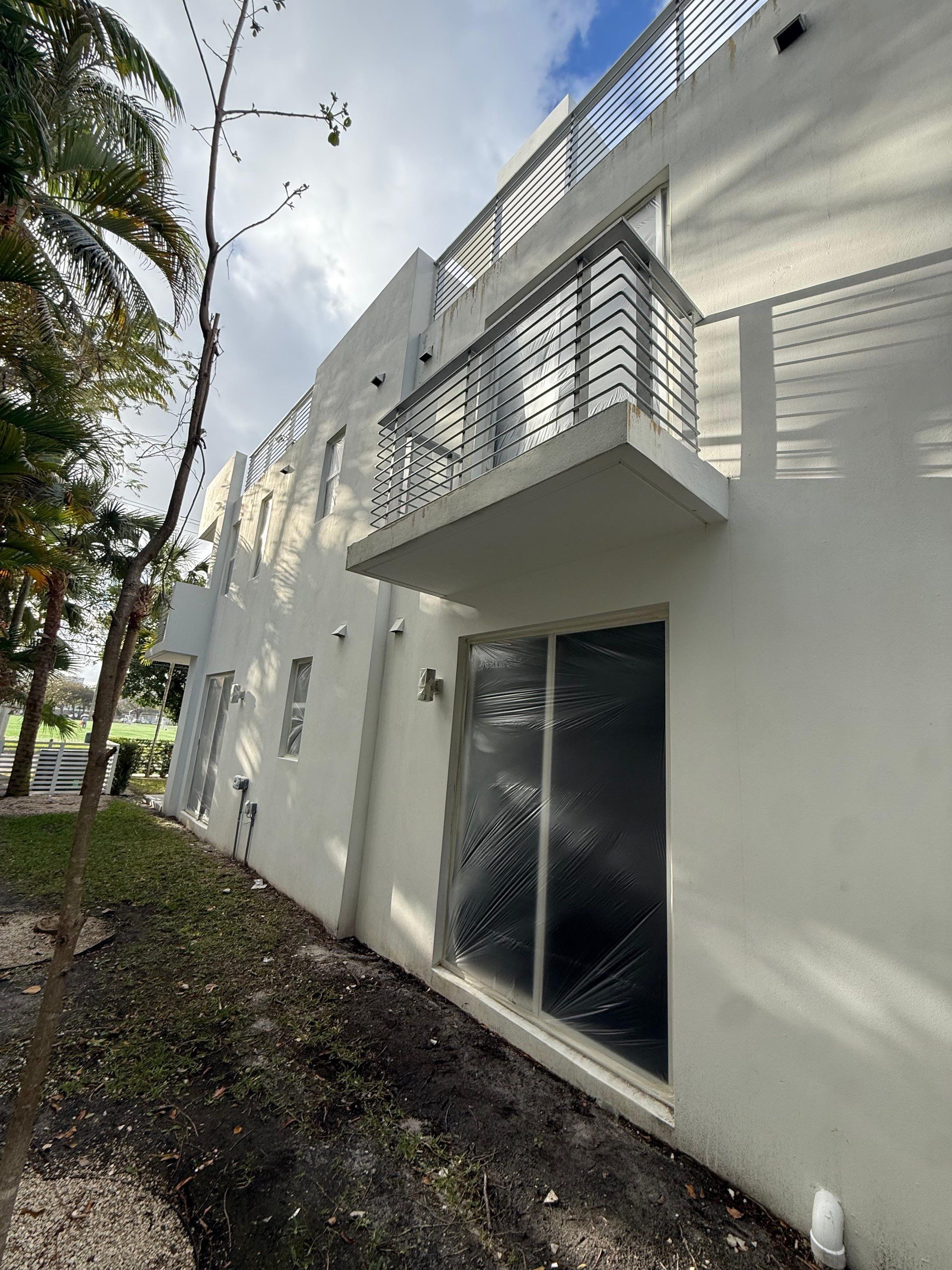 Fort Lauderdale Town Homes Exterior Painting by John “The Greek” Painting