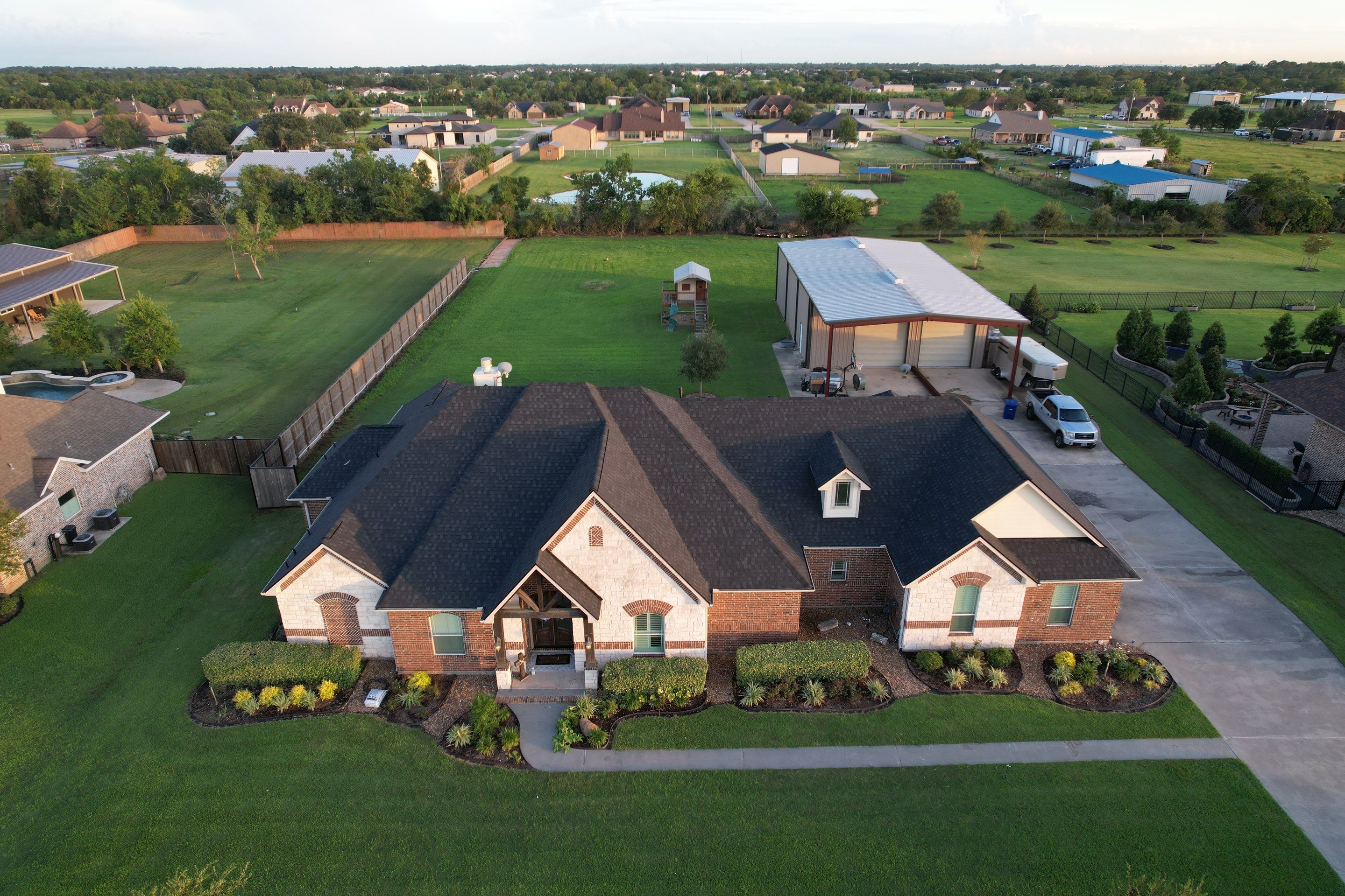 TAMKO Titan XT Rustic Black by STX Roofing
