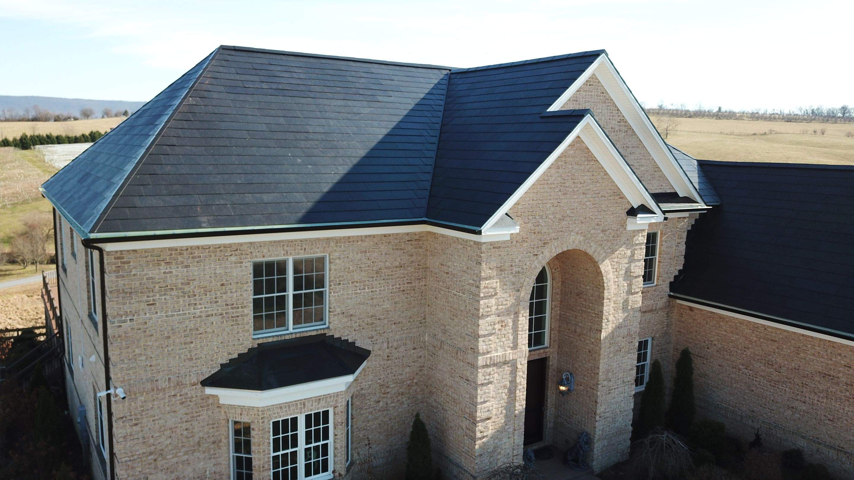 Tesla Solar Roof Replacement by American Home Contractors