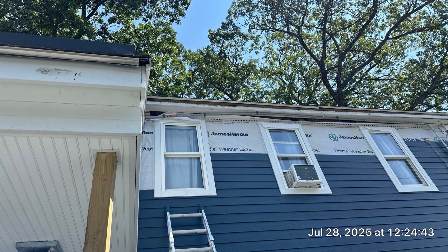 James Hardie Lap Siding Installation in Chelmsford, MA by Mighty Dog Roofing of Greater Middlesex County