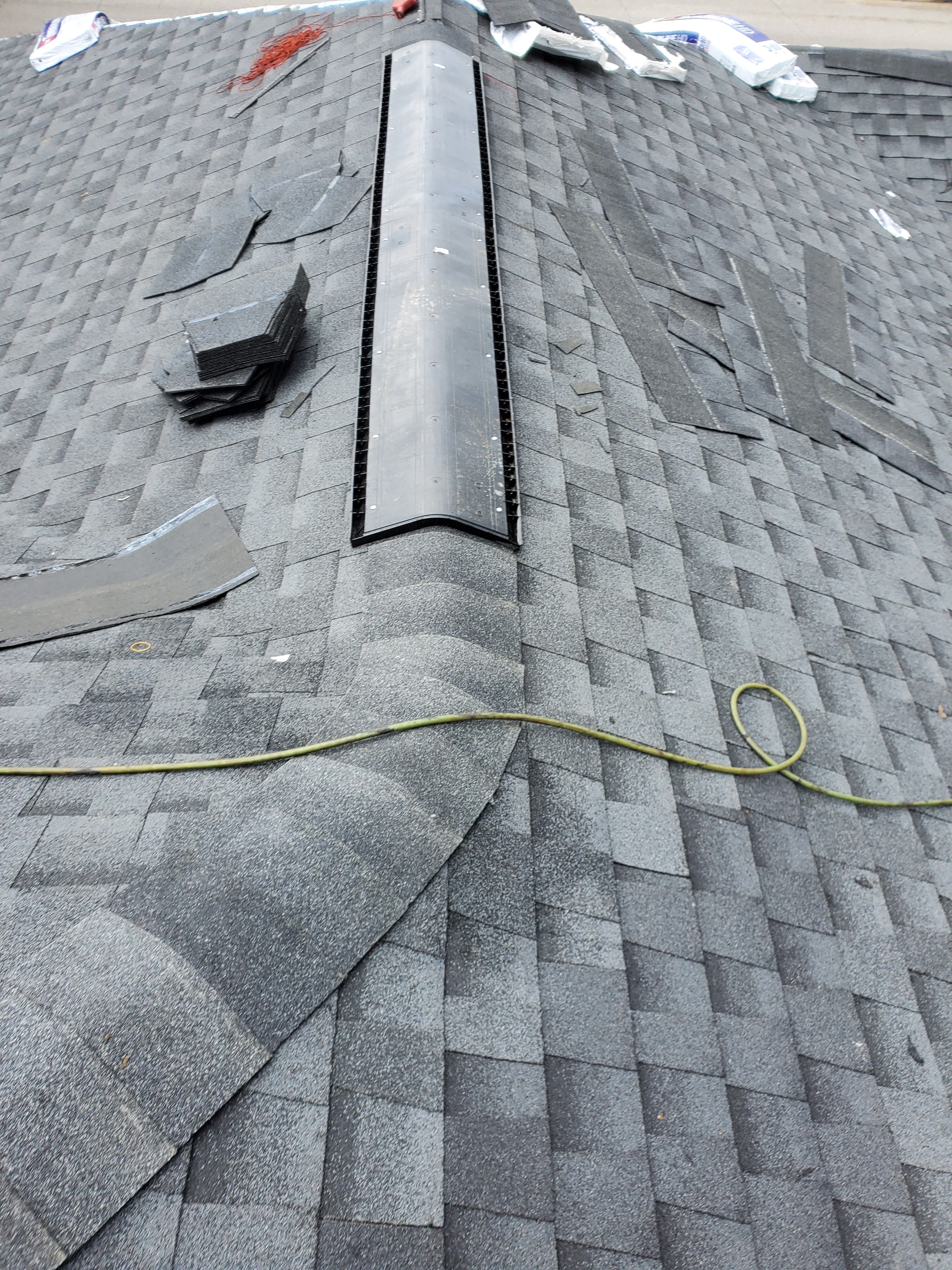 Residential Roofing Installation using Roof Replacement by American Roofing & Construction LLC
