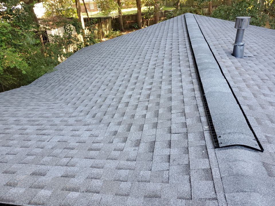 Residential Roofing Installation using Roof Replacement by American Roofing & Construction LLC