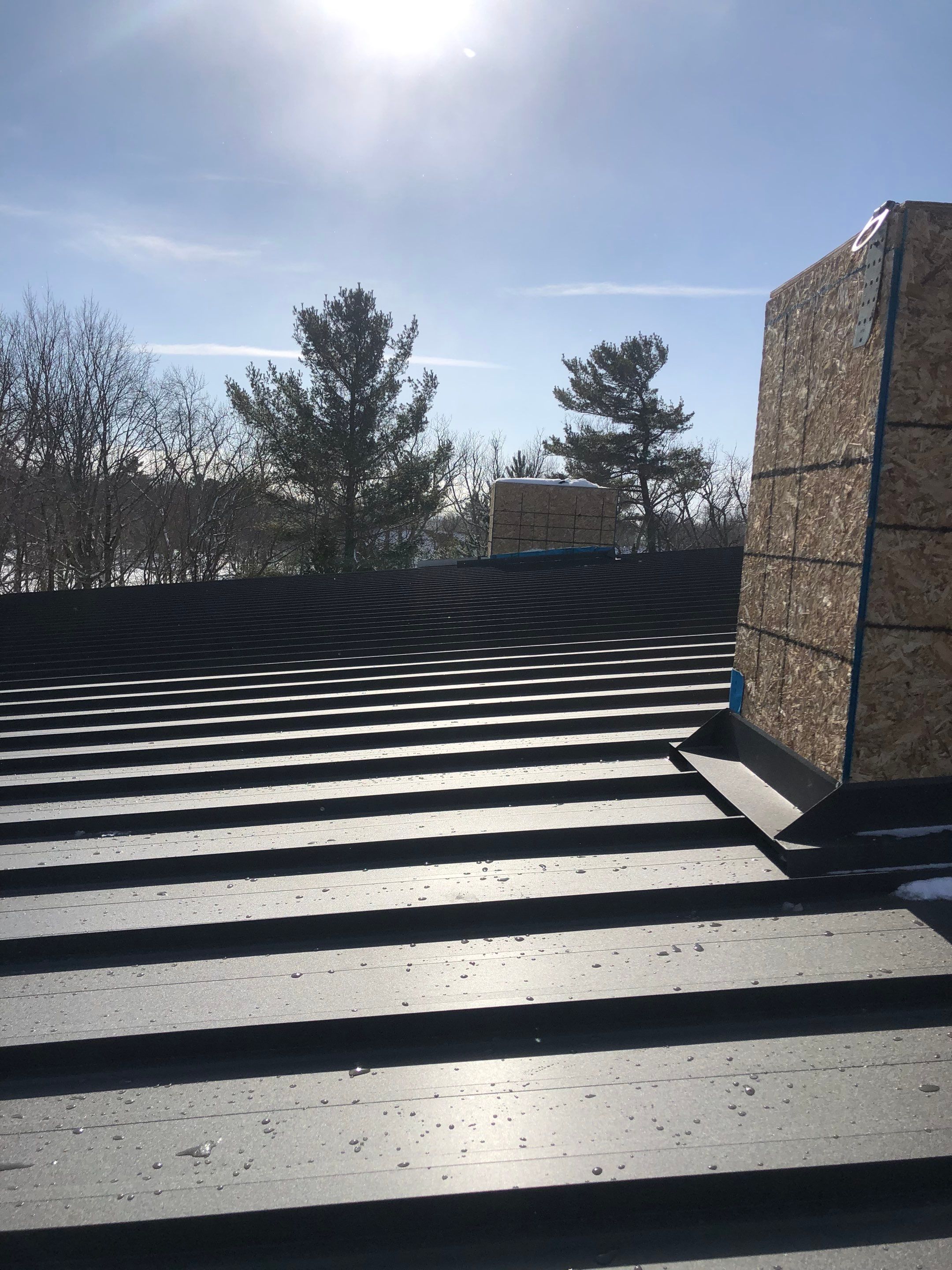 New Home Construction using 16" Standing Seam Panels by Jay Carter Roofing & Sheet Metal