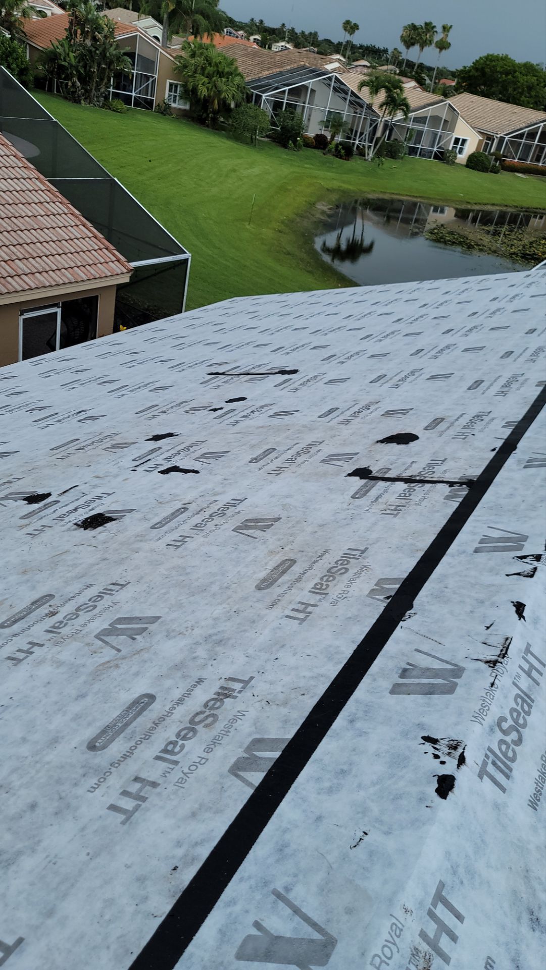 New Barrel Tile Roof Installation and Decking Repair in Boynton Beach by Aastro Roofing