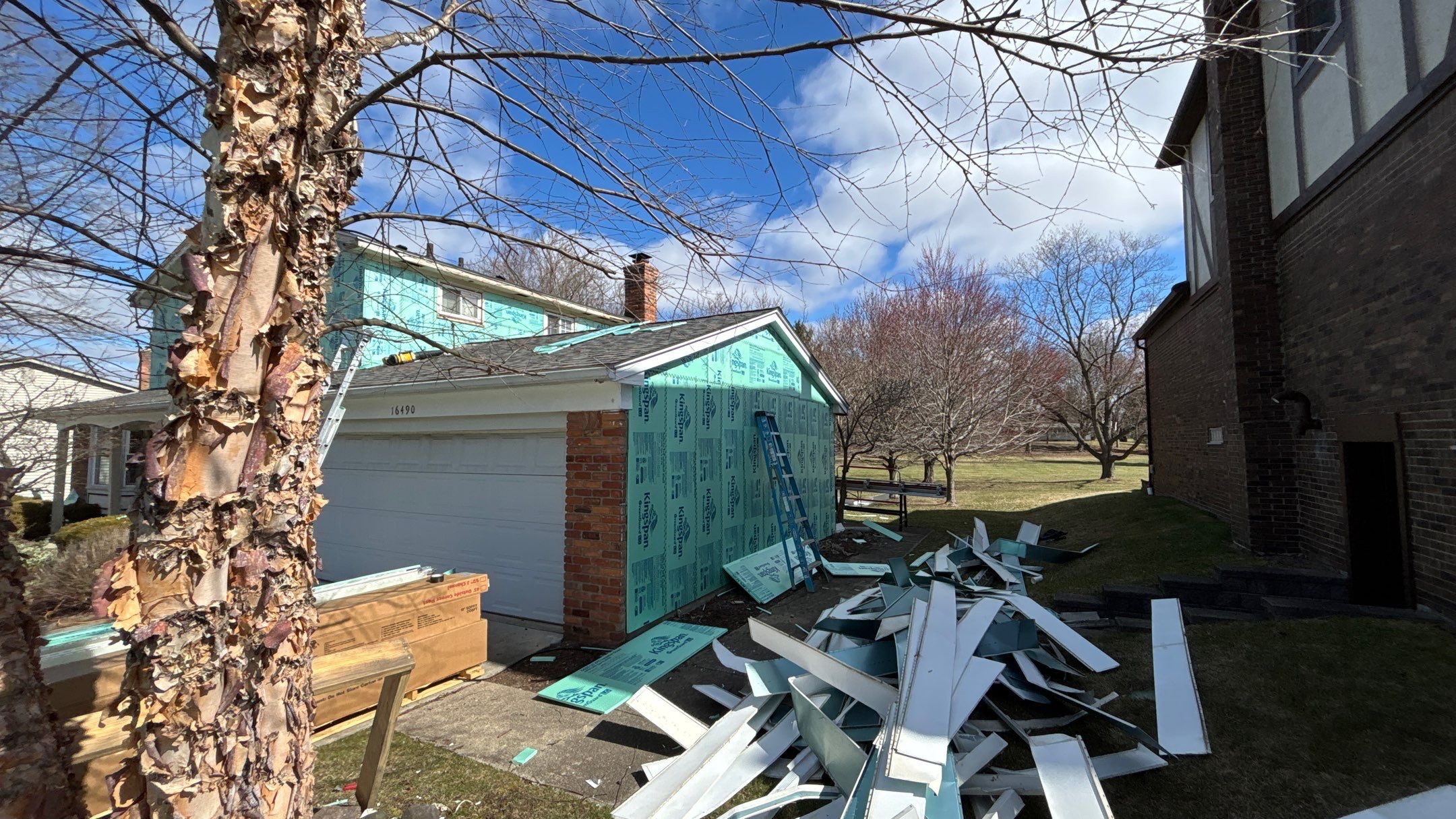 Siding Replacement using Alside Charcoal Smoke and Roof Replacement using Owens Corning Peppercorn by 180 Contractors