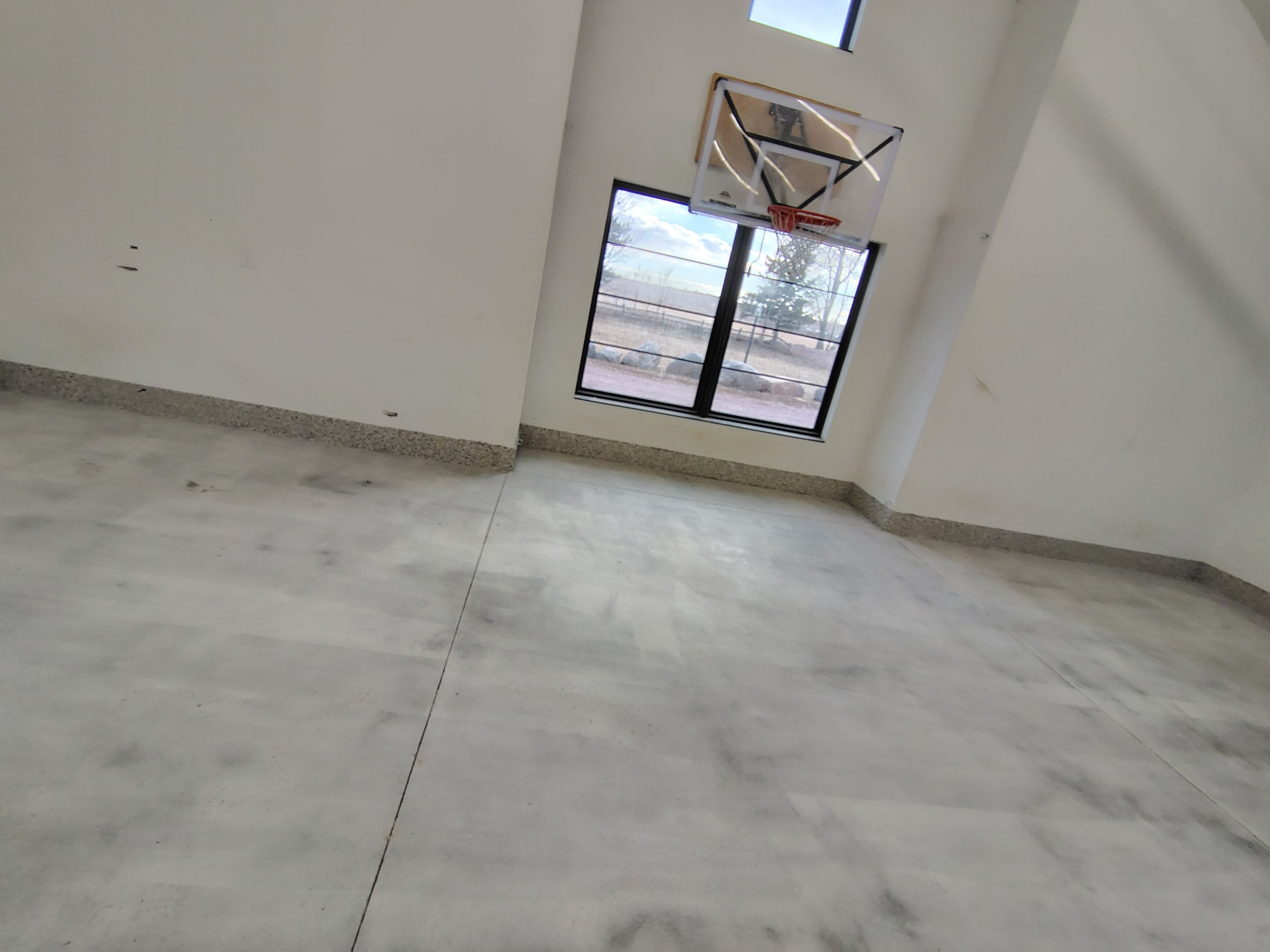 Epoxy Flake Garage Floor and Stair Coating in Sioux Falls by Select Painting, Coatings & Garage Cabinets