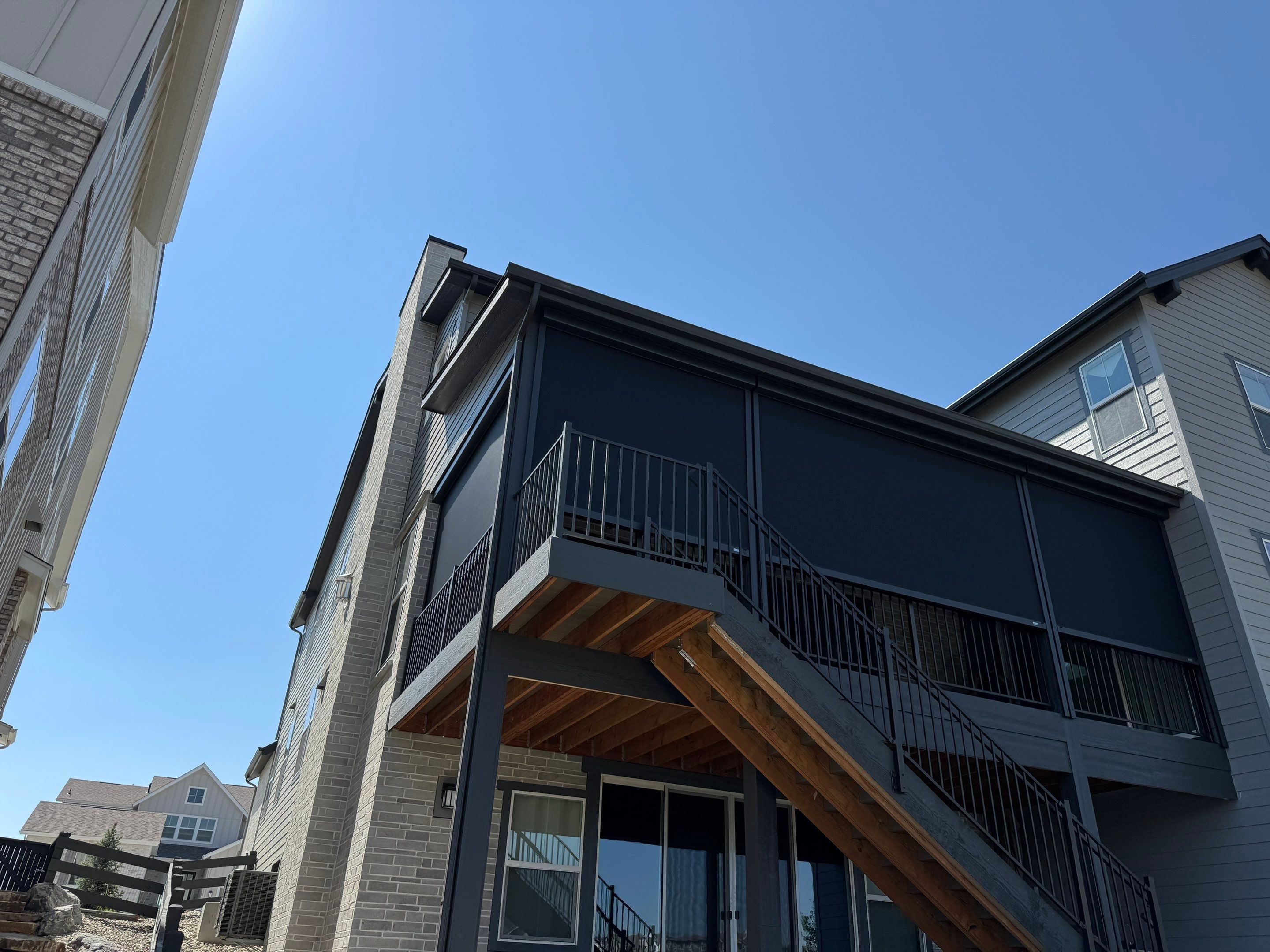 Custom Motorized Screen Installation for Elevated Deck in Castle Pines by Outdoor Solutions Colorado