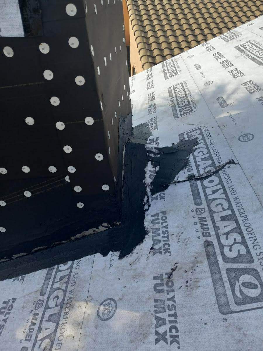 Complete Chimney Rebuild + Tile & Flat Re-Roof  by Morton Roofing, Inc.