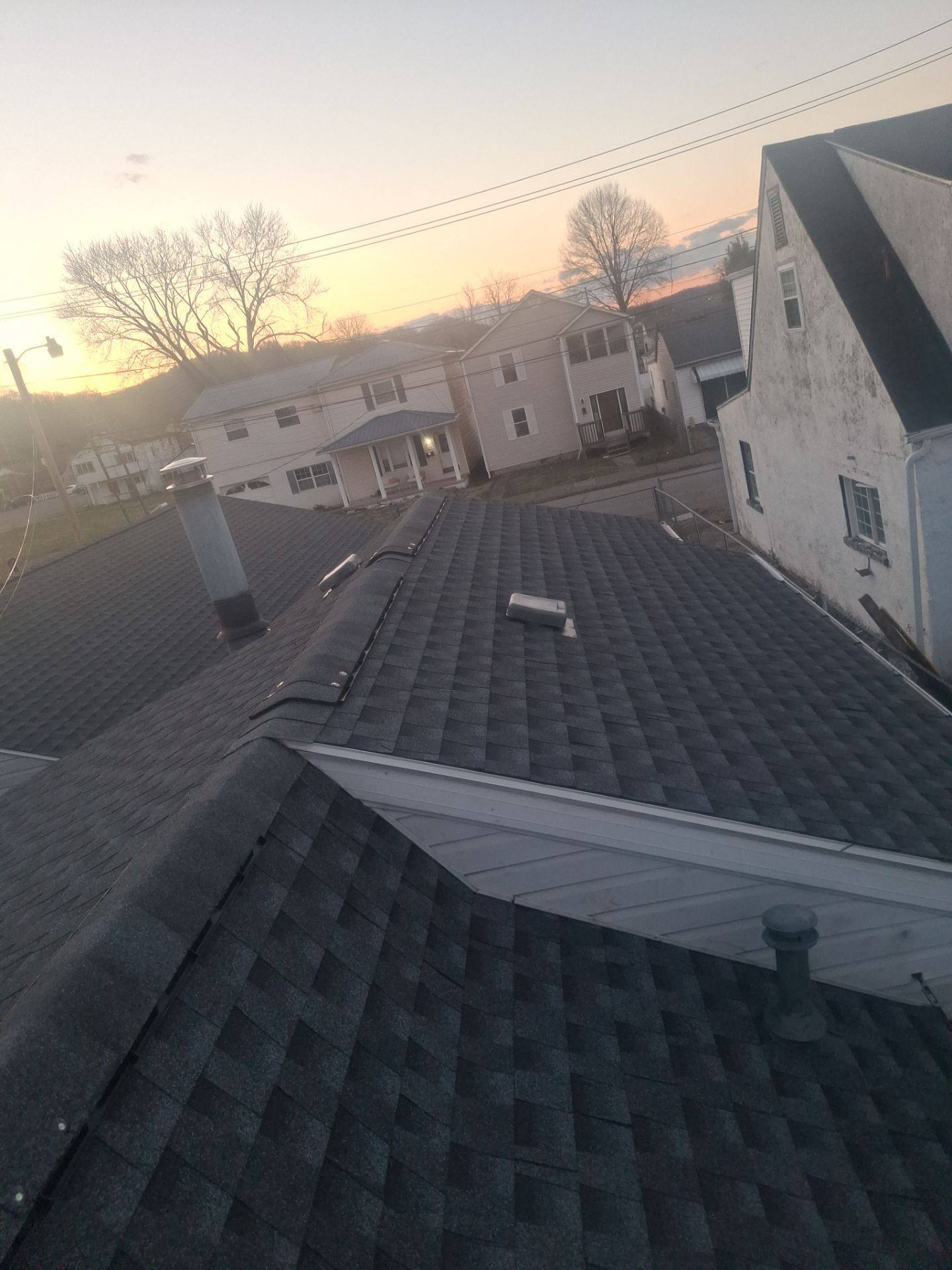 Residential Roofing Installation using GAF Timberline HDZ Pewter Gray by Rainstoppers Roofing