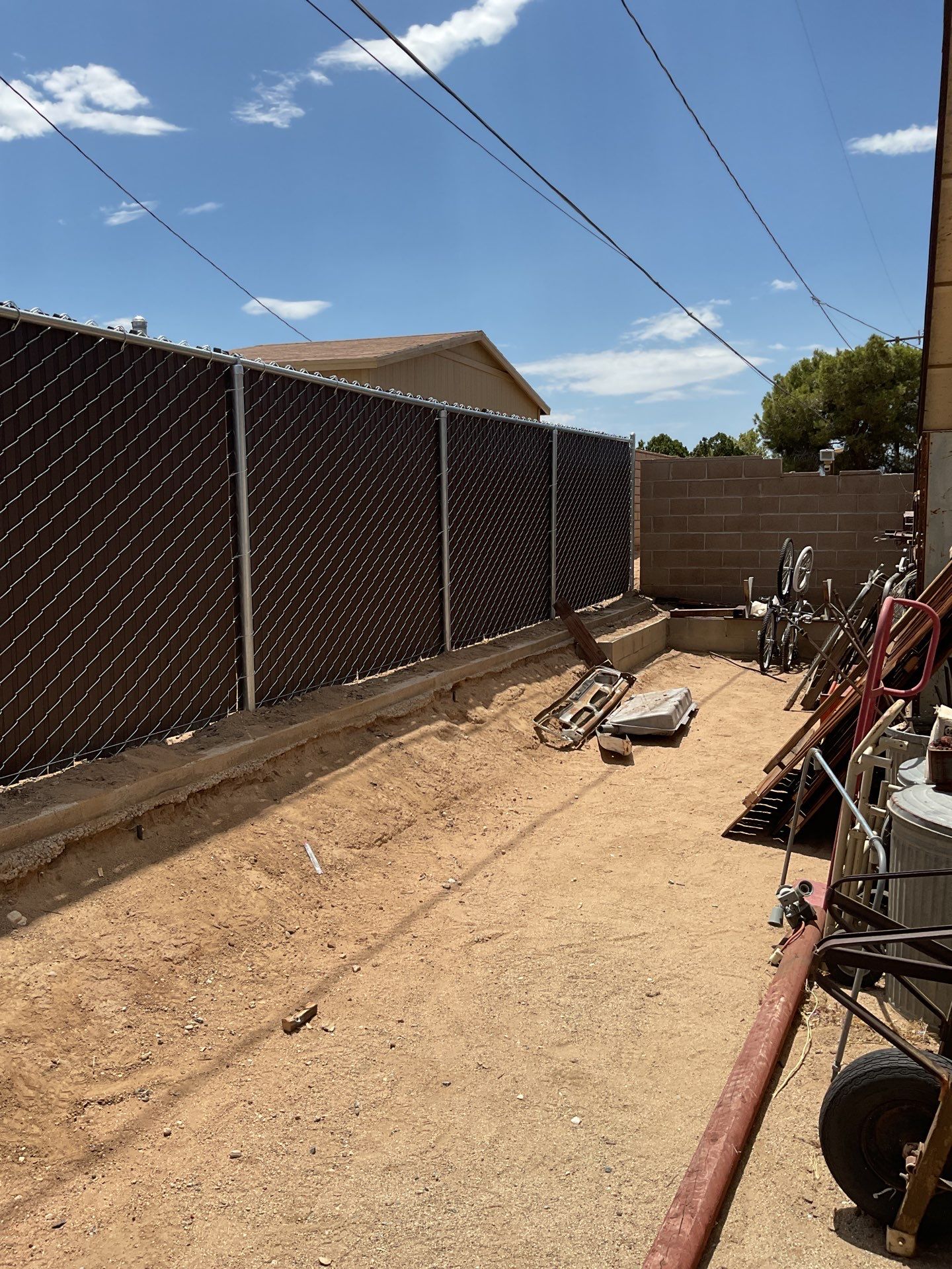Dark Brown Privacy Chain Link Fence by Fence Guys Inc.