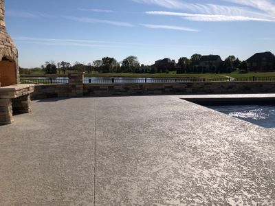 Parkville, MO -- Pool Deck Coating with Classic Texture (knockdown) finish