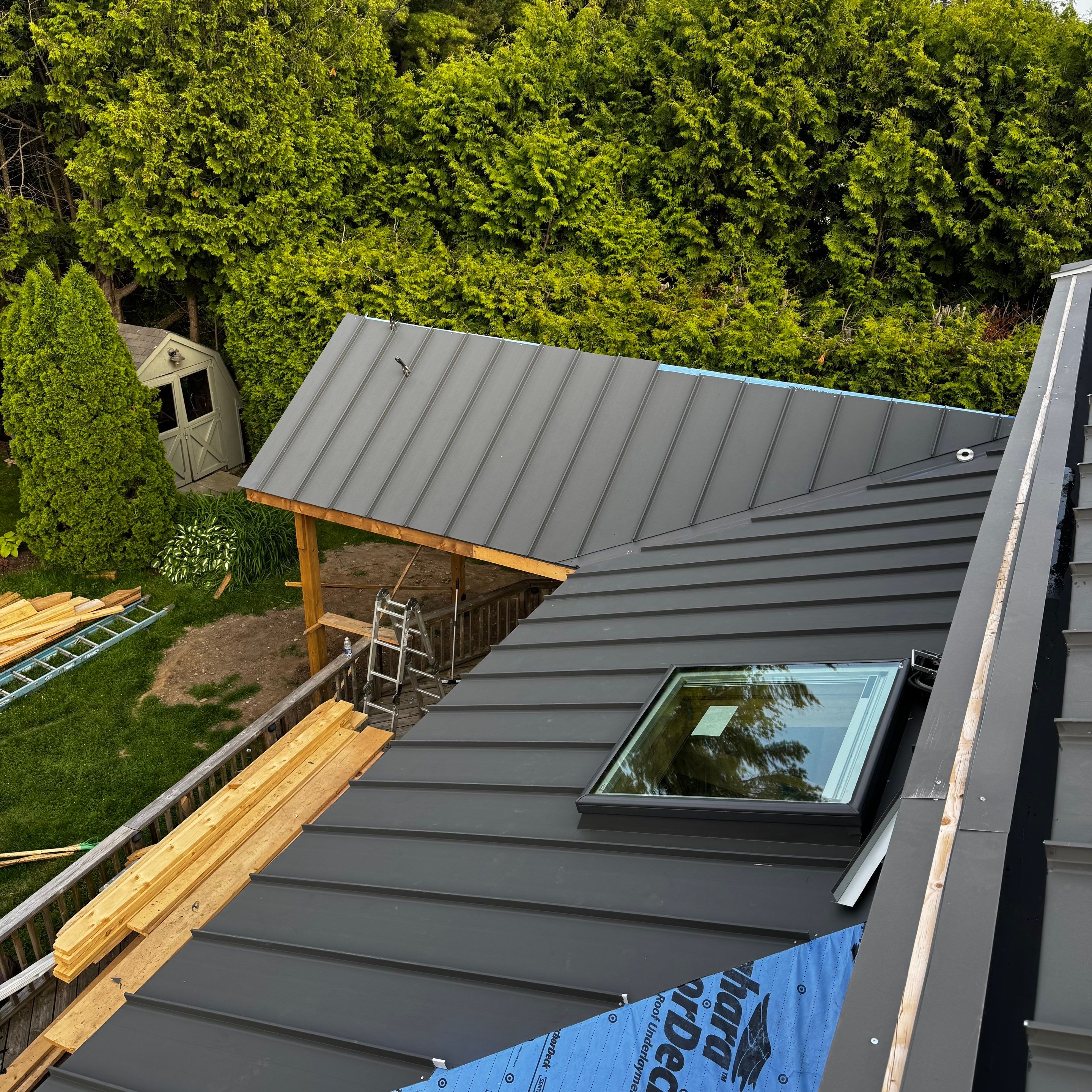 Residential Roofing Installation using 16" Standing Seam Panels by Jay Carter Roofing & Sheet Metal