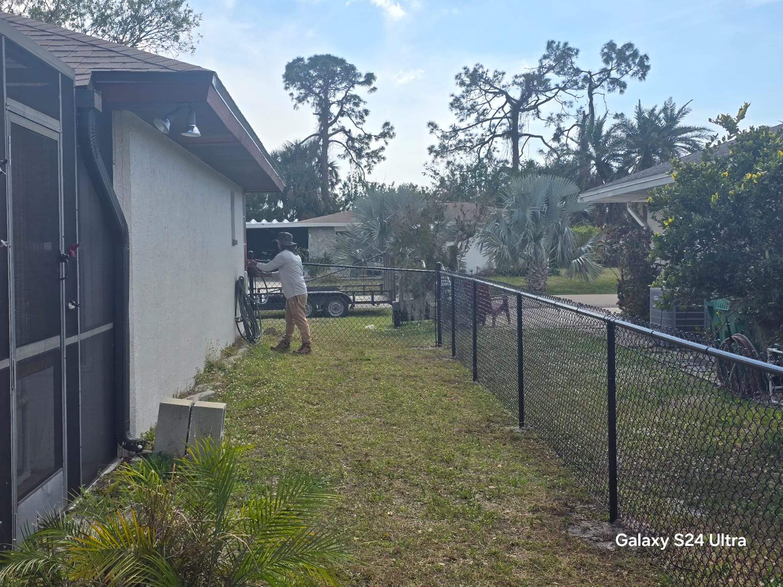 Black Chain Link Fence Installation for Port Charlotte Residence by True Fence LLC