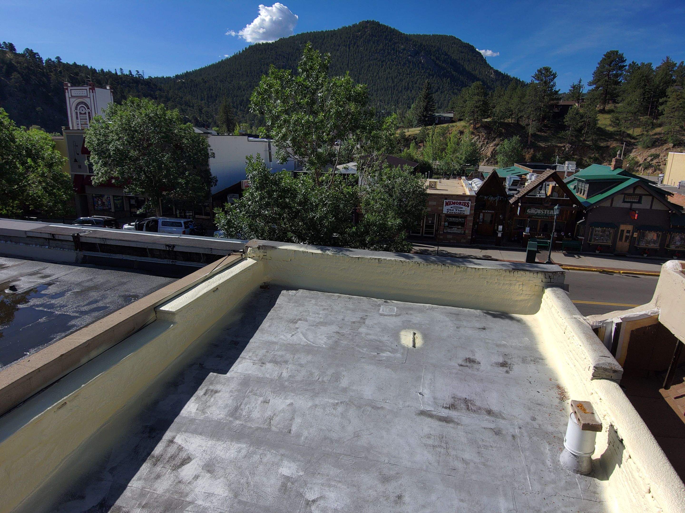 Estes Park "The Taffy Shop" Before & After Gaco Coating by Blue Peaks Roofing LLC