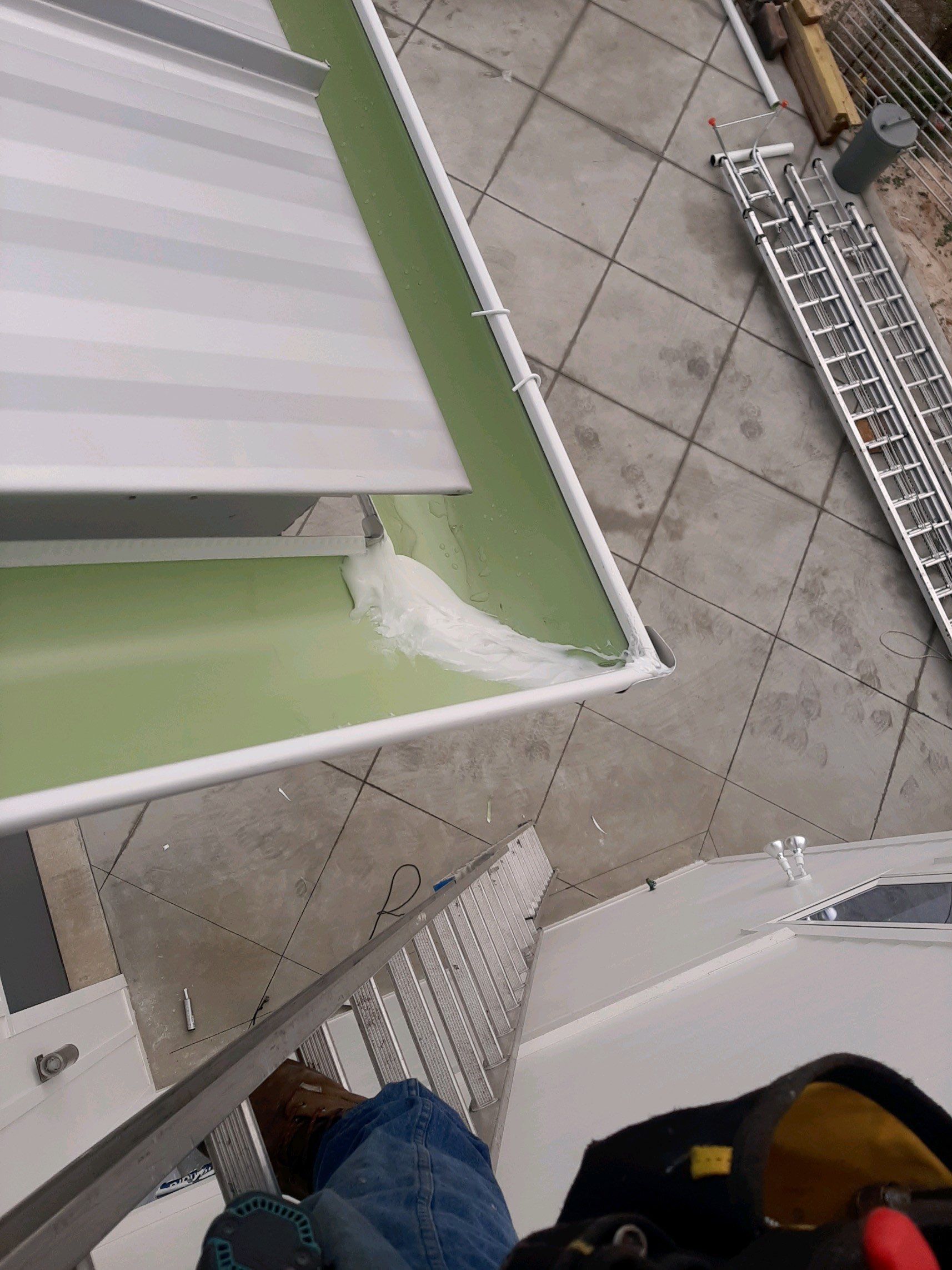 Gutter Installation Using 6 Inch Seamless Aluminum Gutters by Gutter Professors