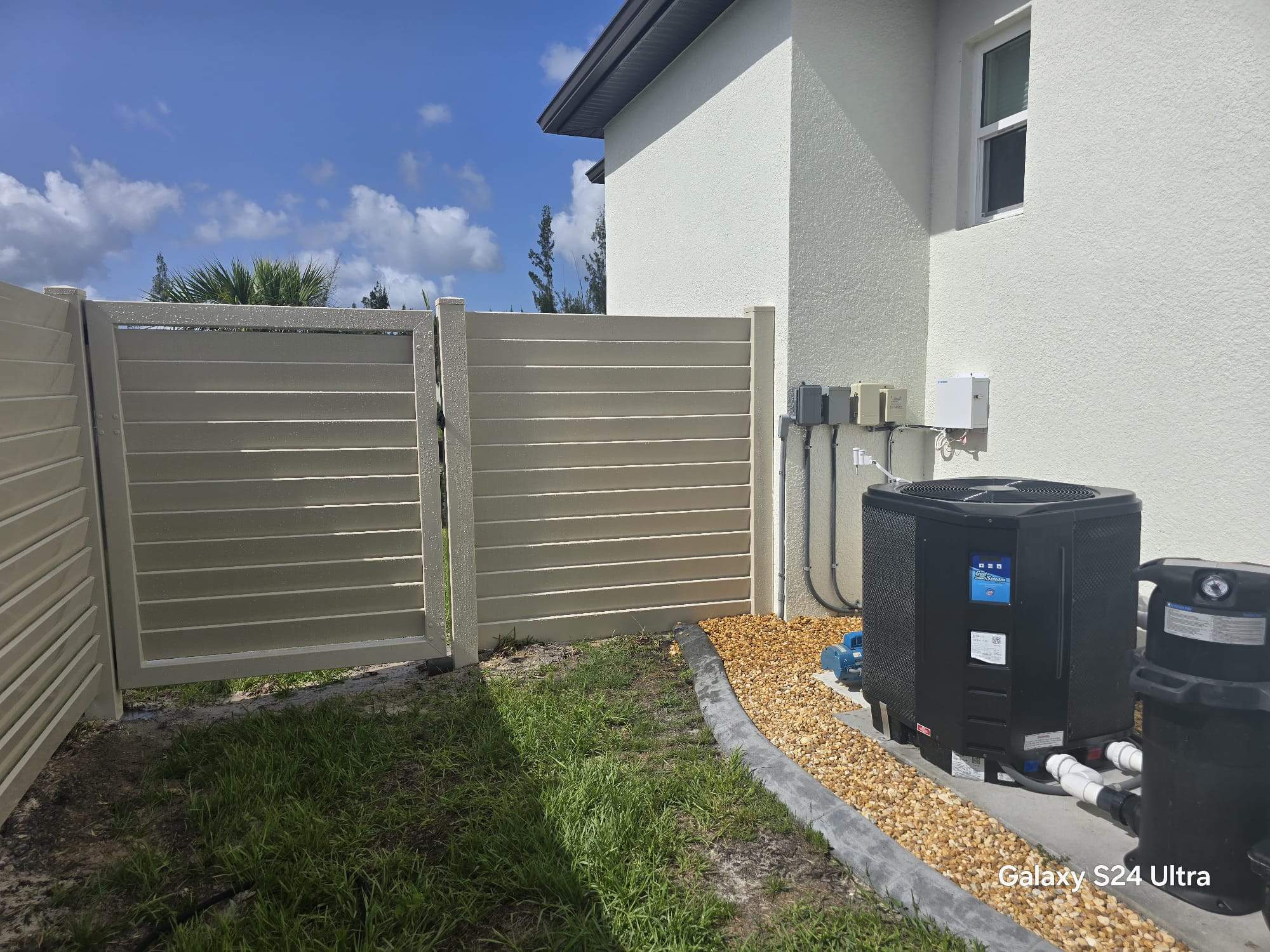 Tan Louvered Vinyl in Port Charlotte by True Fence LLC
