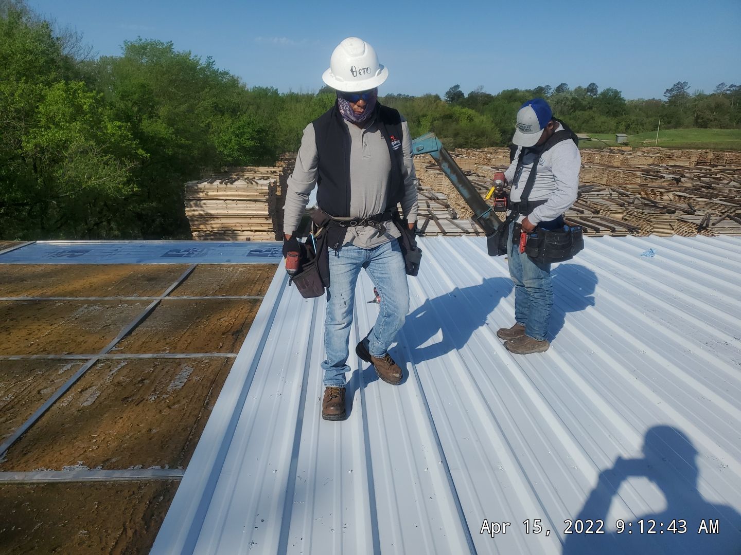 Commercial Roofing Installation using Aluminum Roofing panels by Hostetler Roofing