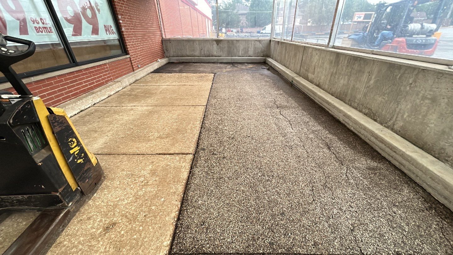 Concrete sidewalk cleaning and degreasing by Northern Power Washing LLC.