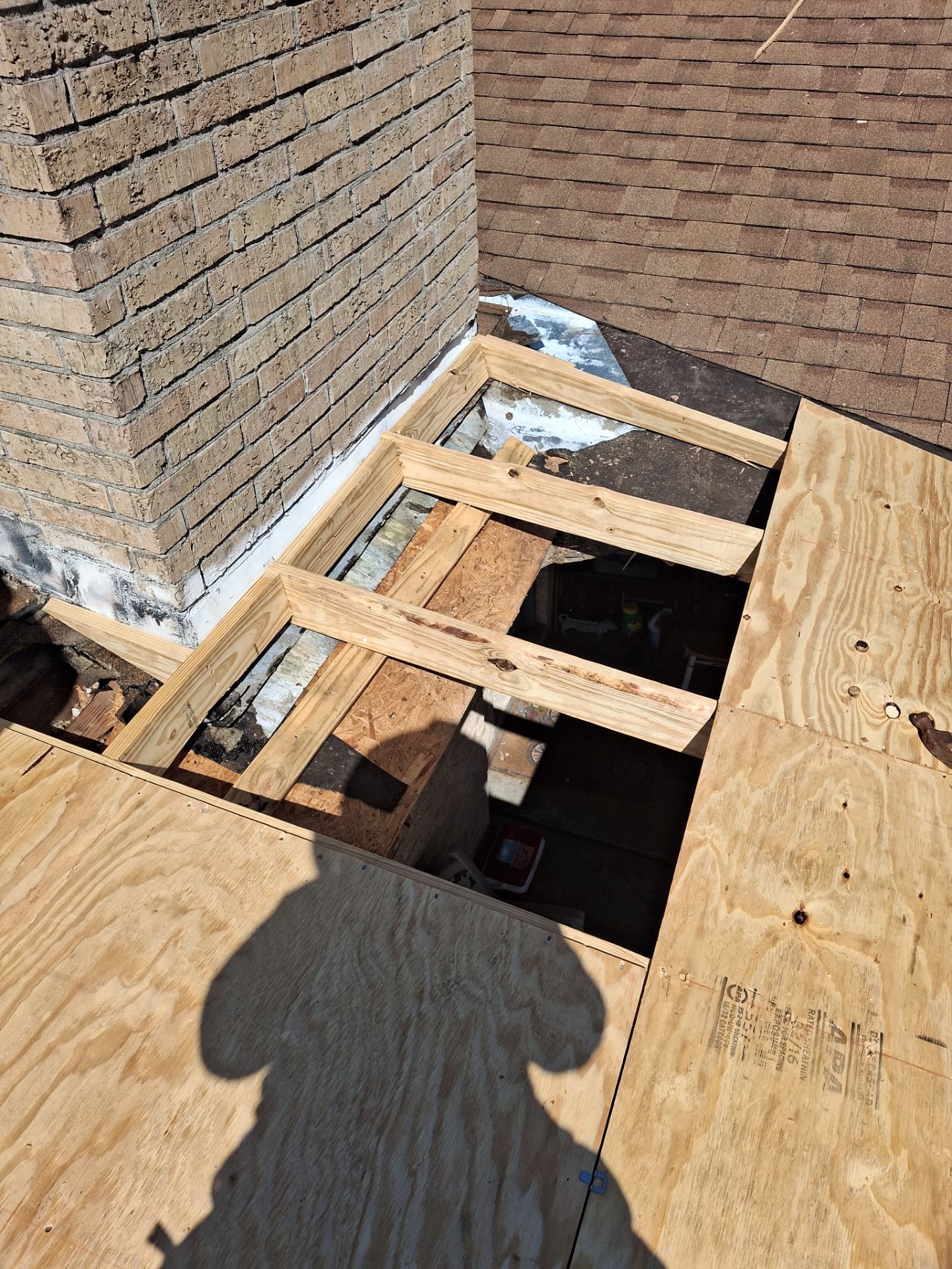 Chimneys need a Cricket.  by Bayfront Roofing and Construction