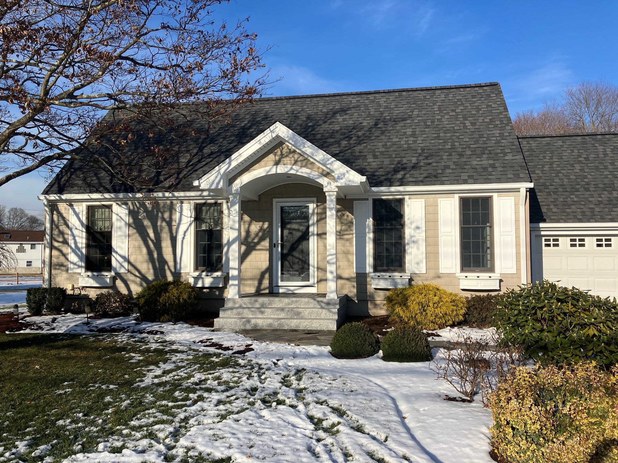 Welcoming portico addition by DiGiorgi Roofing and Siding Inc