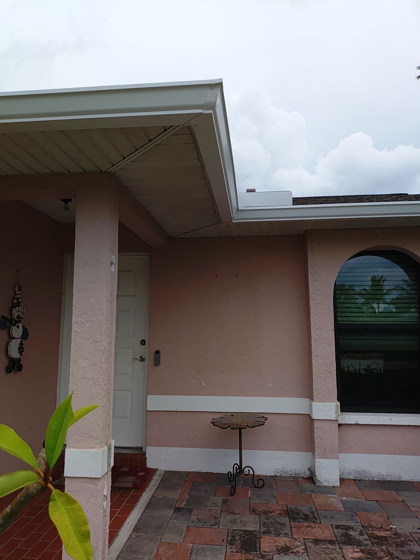 Replace gutter using White Down Spouts in Cape Coral FL by Gutter Professors