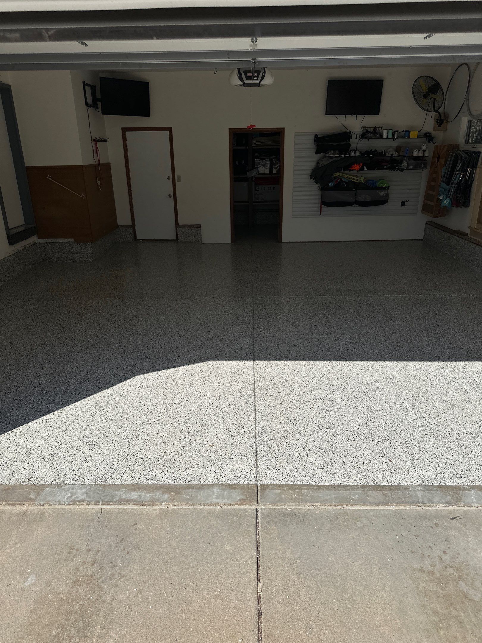 Two-Stall Epoxy Garage Floor Coating and Repair in Lincoln by Goat Coatings