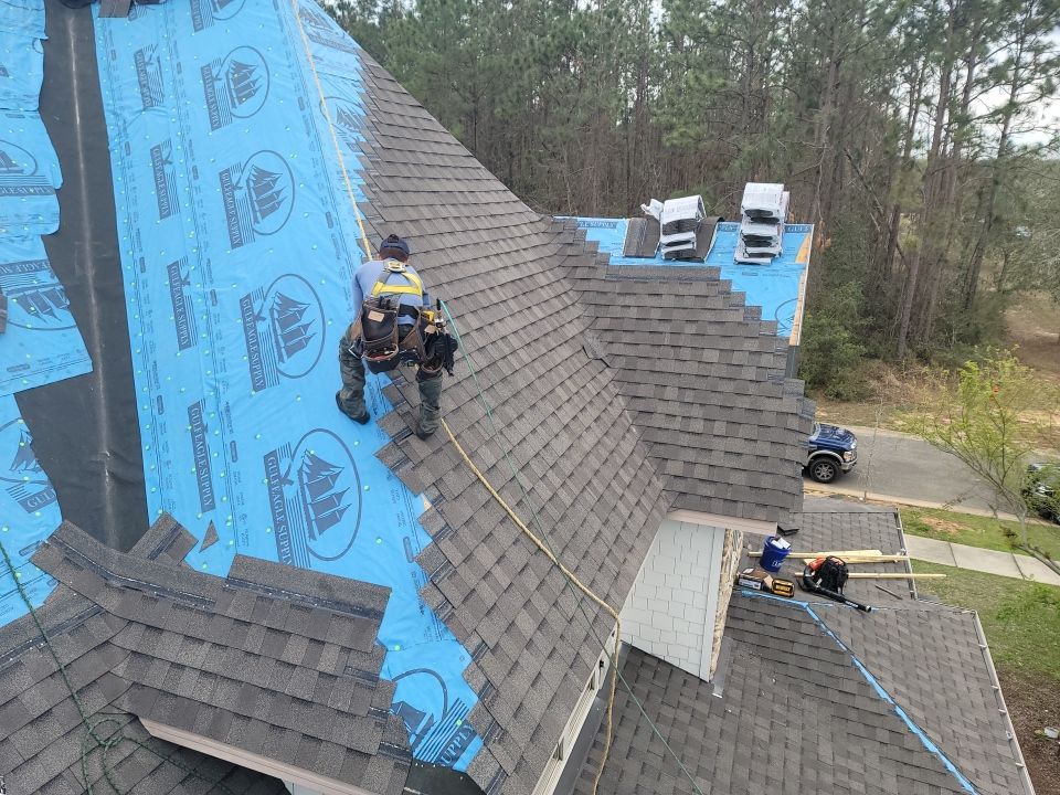 Residential Roofing Installation using Roof Replacement by American Roofing & Construction LLC