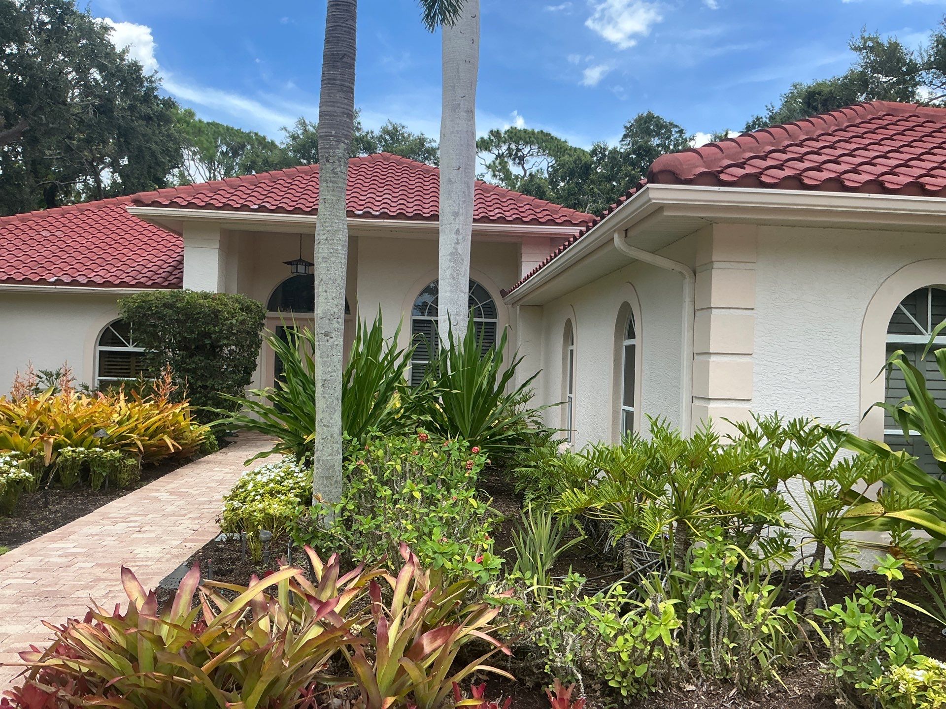 Splash Guard Gutters for Rainy Season Protection in Osprey FL by Gutter Professors