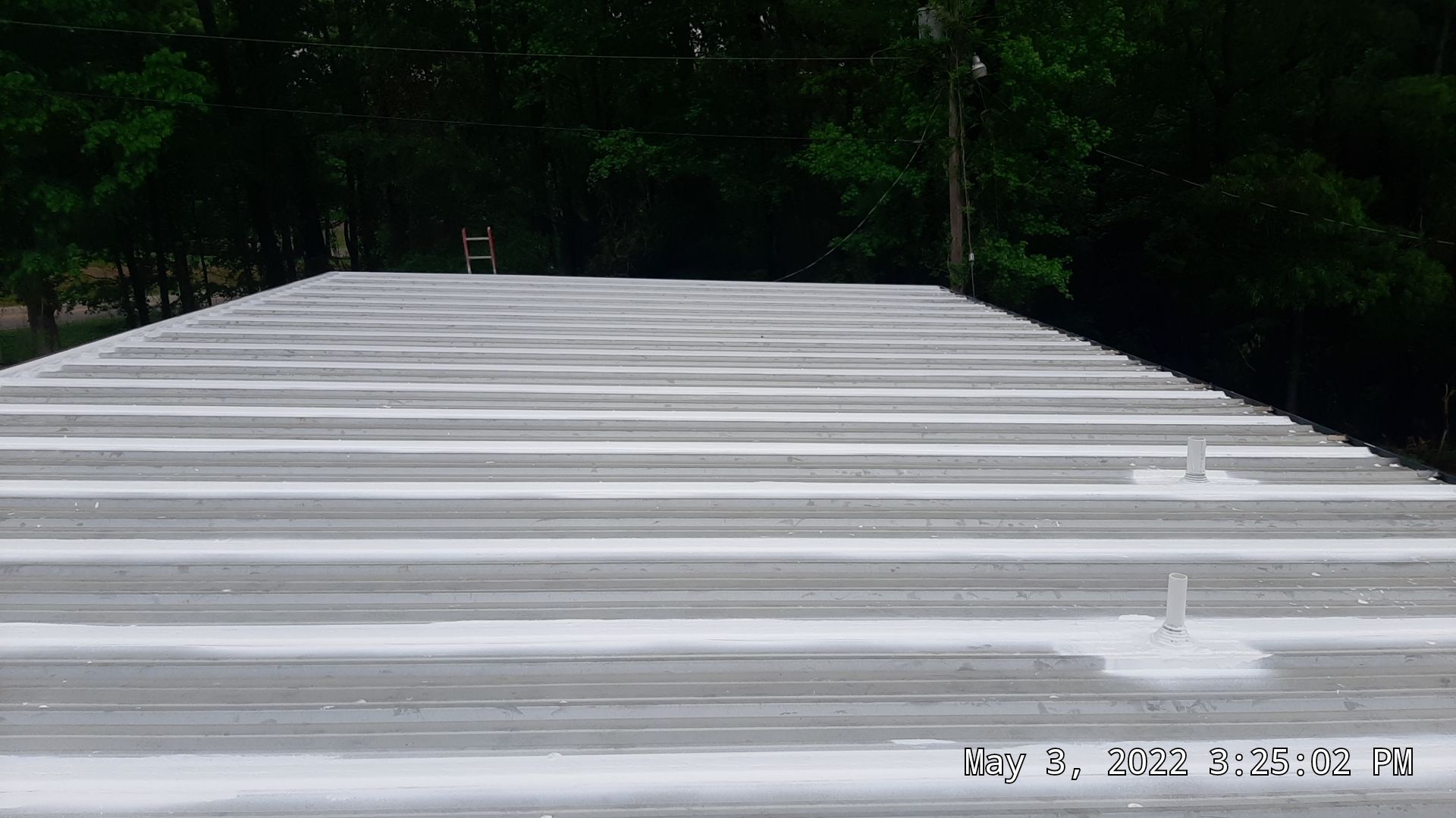 Commercial Metal Restoration System using Aldocoat Coatings by Hostetler Roofing