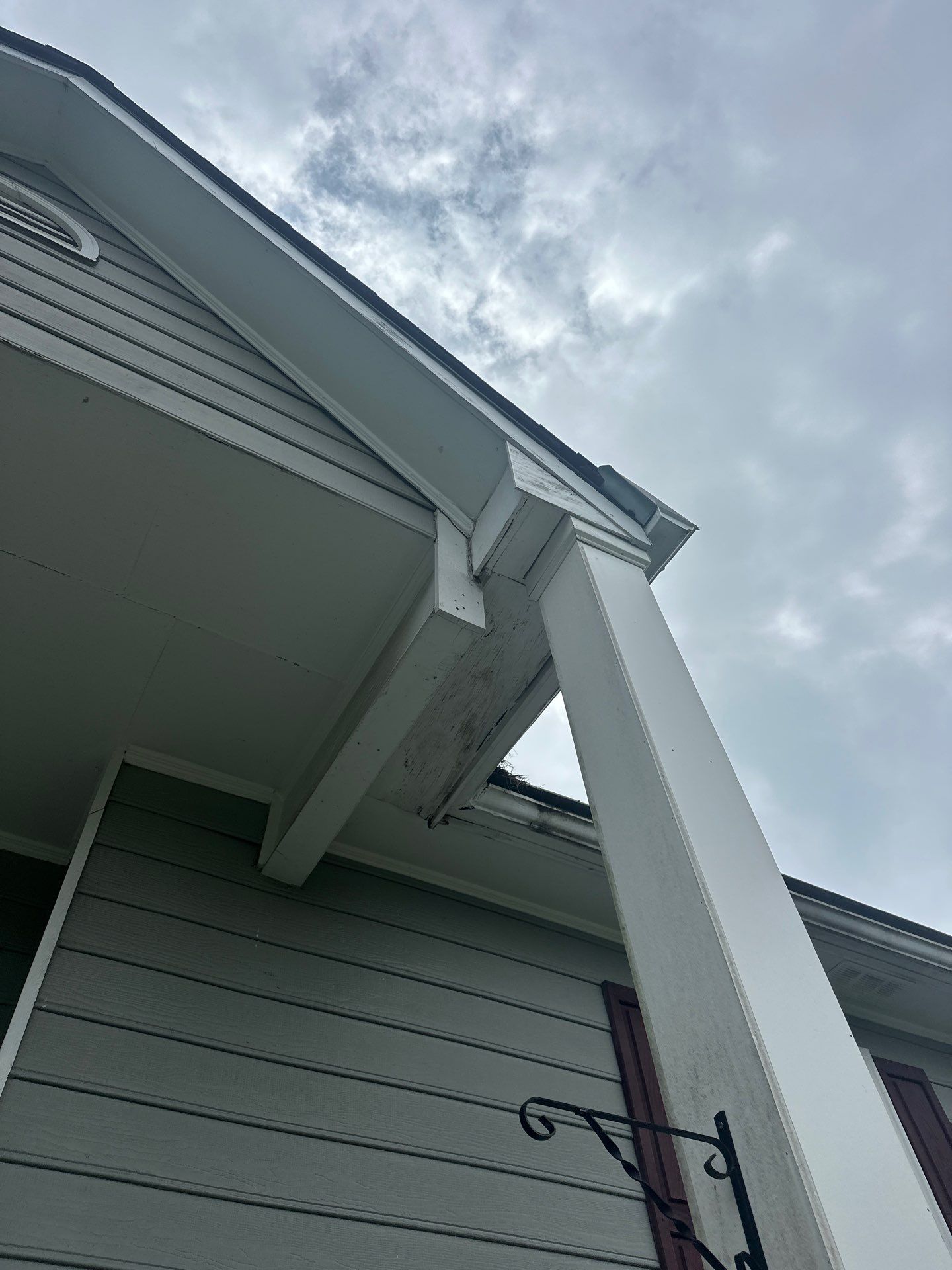 Alpharetta, GA Partial Siding Replacement, Porch Stain, and Exterior Painting by Nelson Exteriors