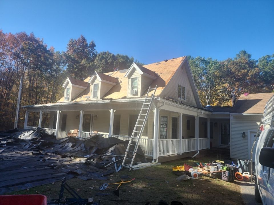 Skylights and Roof Replacement in Upton, MA by Master Roof Inc