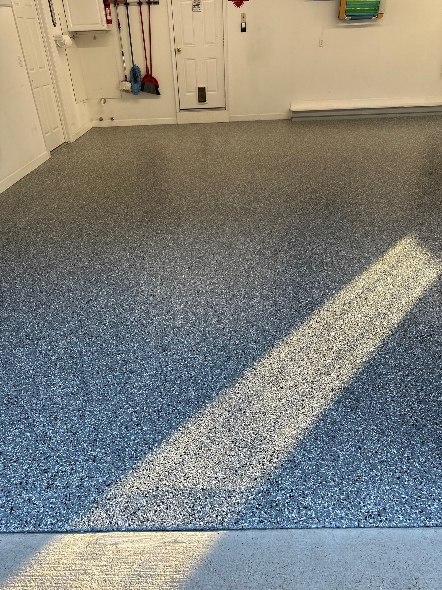 Garage Floor Coating using Wombat by My Garage Floor Guys