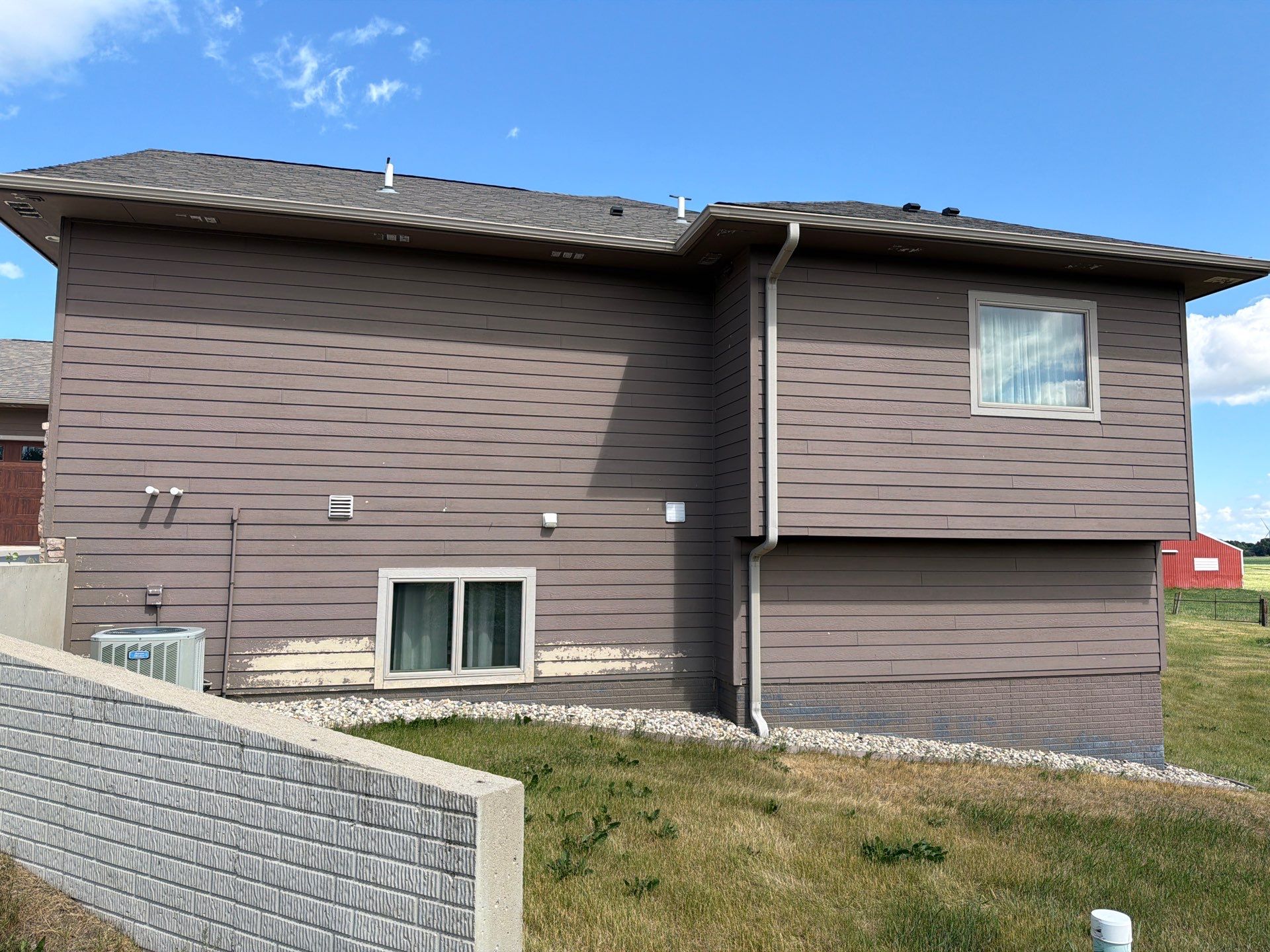 Full Exterior Siding Paint Restoration and Refresh in Garretson by Select Painting, Coatings & Garage Cabinets