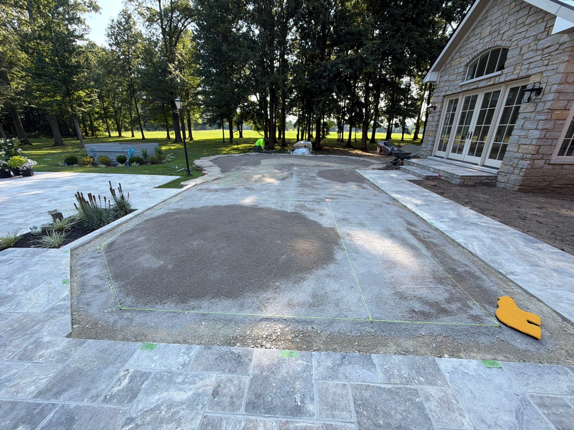 Custom Backyard Golf Green Accented by Flagstone Border in Morrow, OH by Southwest Greens Midwest