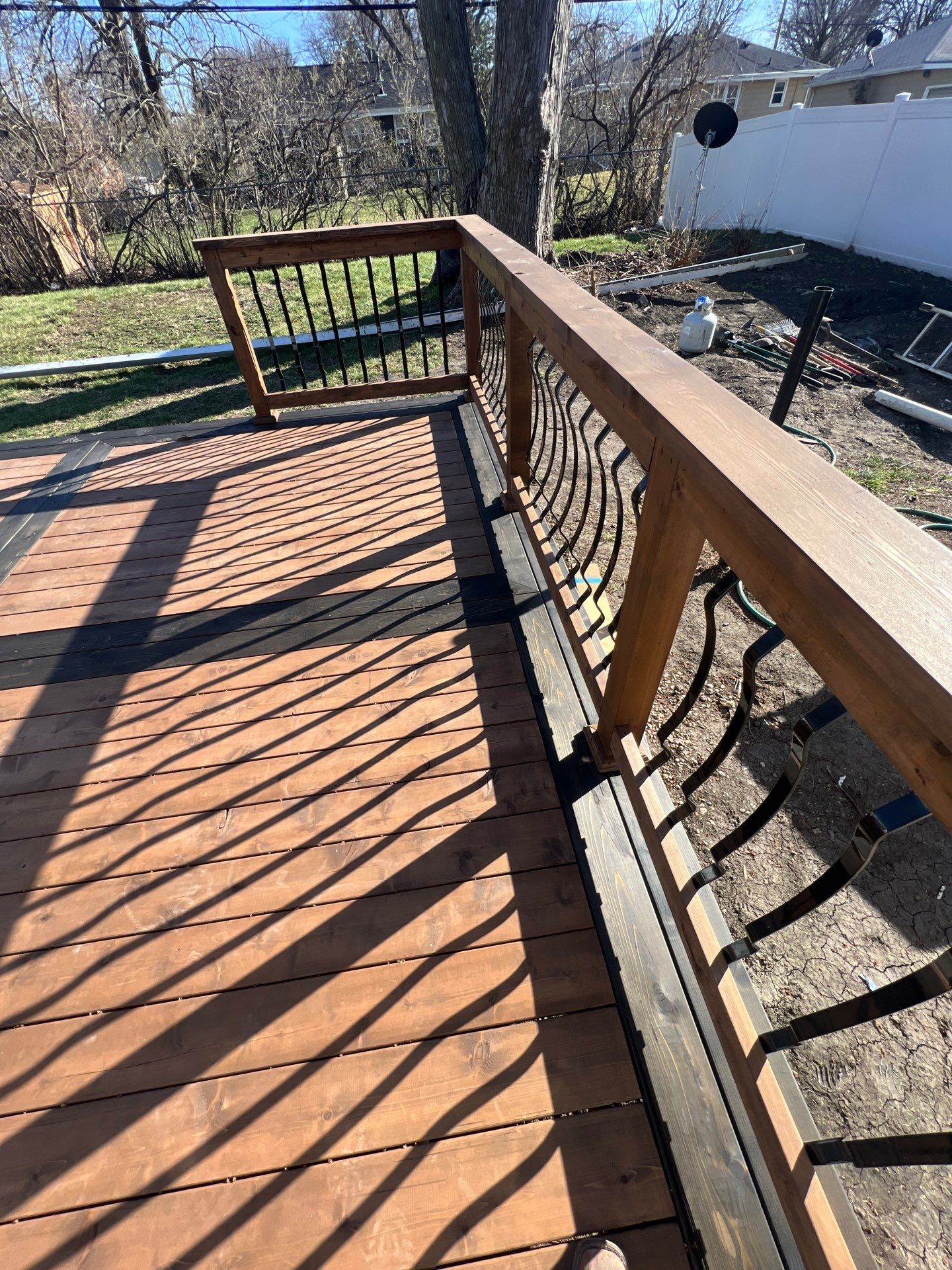 Deck re stained  by Cutting edge painting 