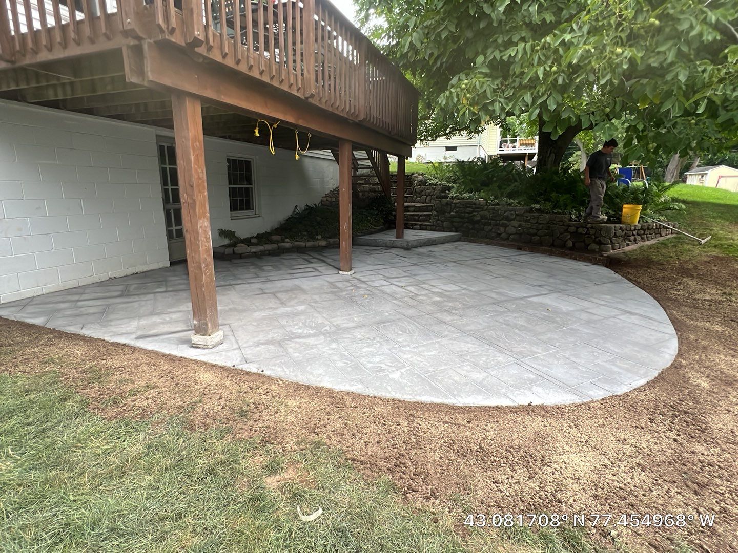 Majestic ashlar stamped concrete patio  by NG Masonry & Construction LLC