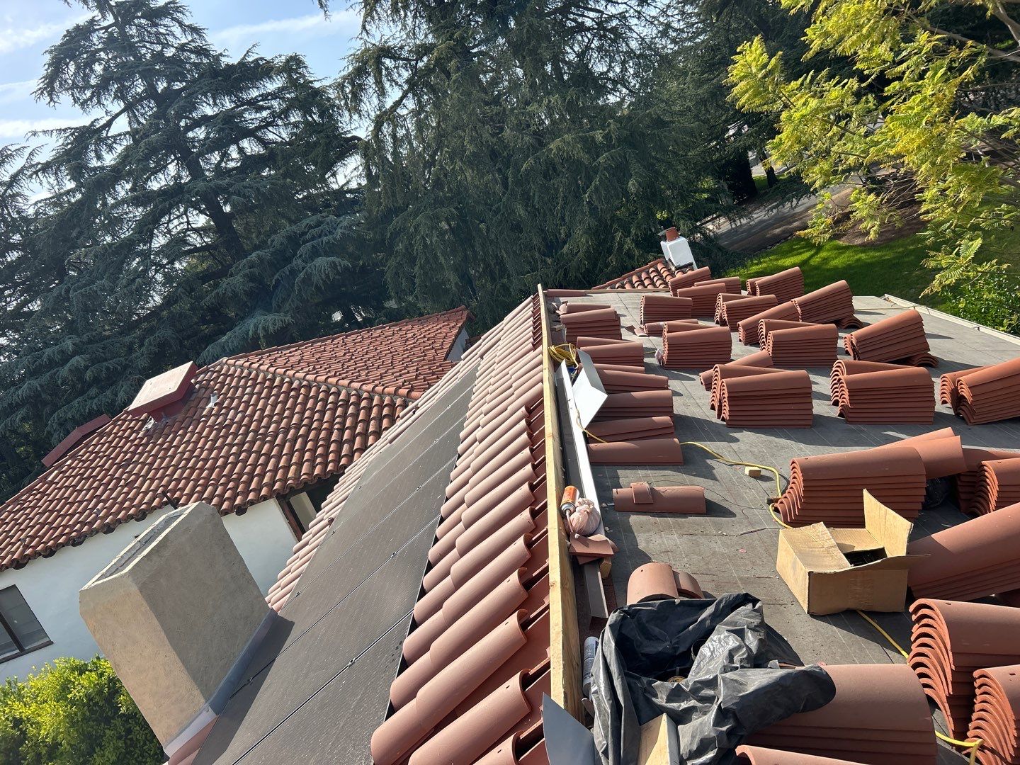 Spanish-Style Roof Replacement with Integrated Solar in Altadena by Reliable Roofing San Diego Inc.